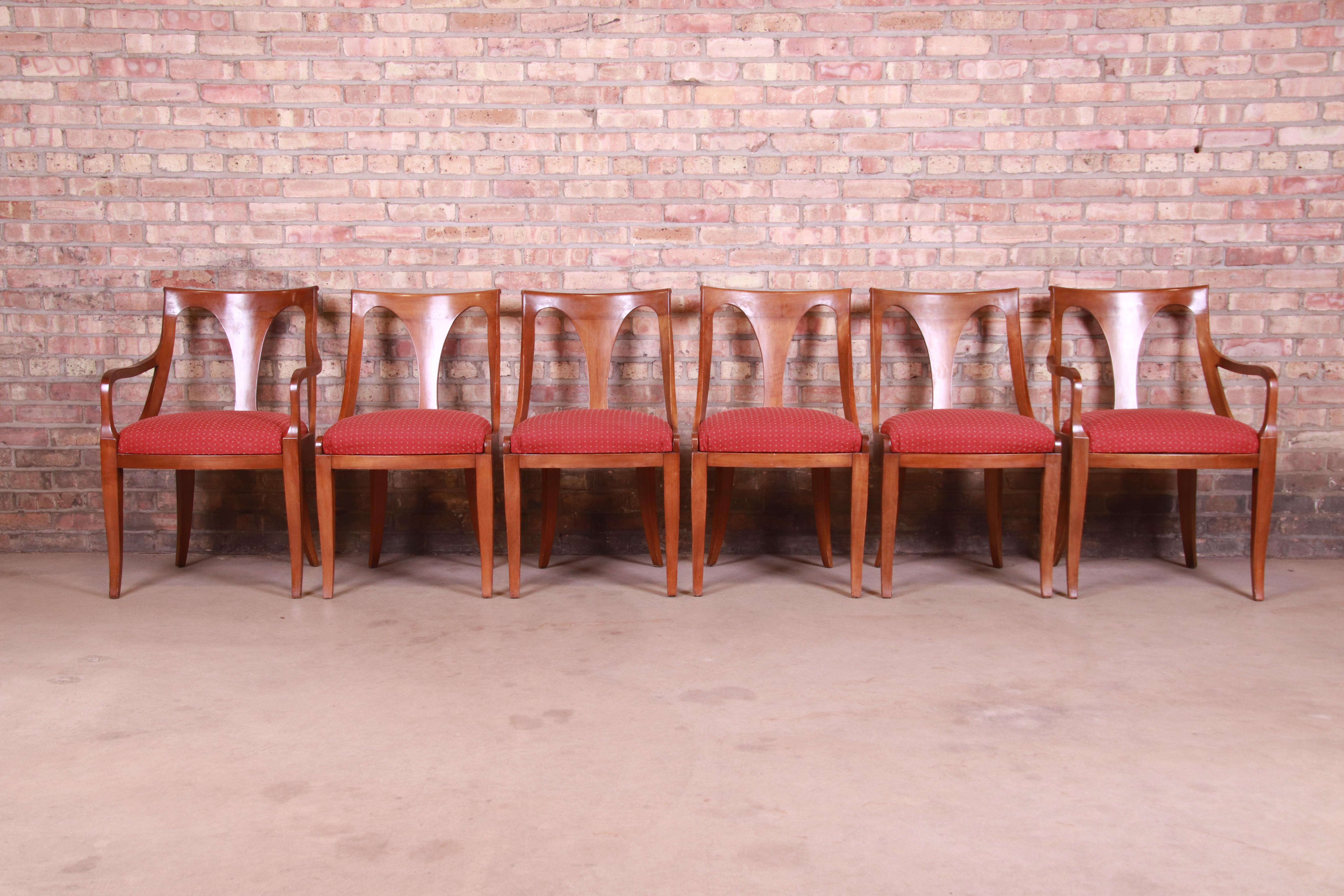 An outstanding set of six Regency style dining chairs

By Kindel Furniture

USA, mid-20th century

Solid cherry wood frames, with red upholstered seats.

Measures:
Side chairs - 19.25