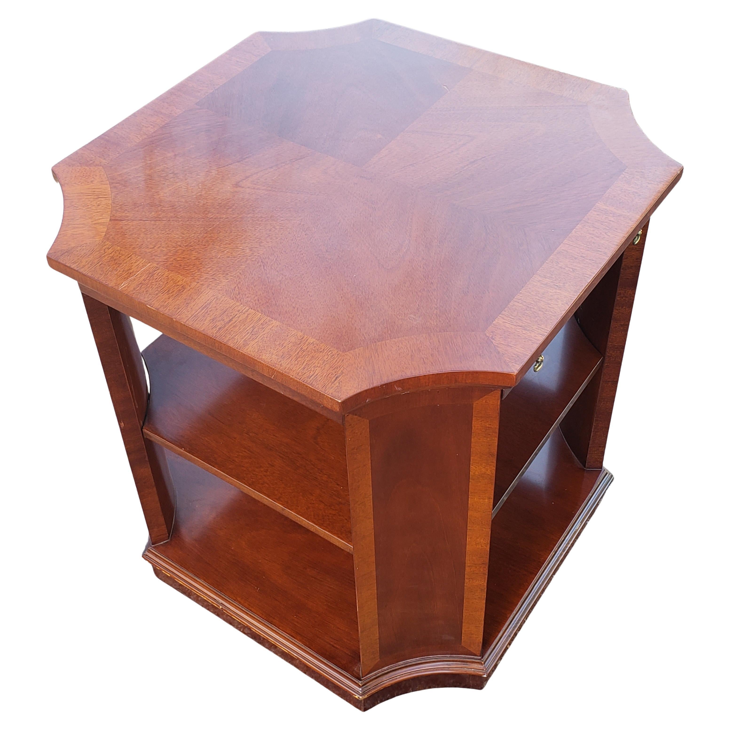 Vintage end table or occasional table in solid mahogany, with both an adjustable shelf and a pullout tray, from Kindel Furniture Winterthur Collection. May be used in office setting as library end table or as a server table in the dining room