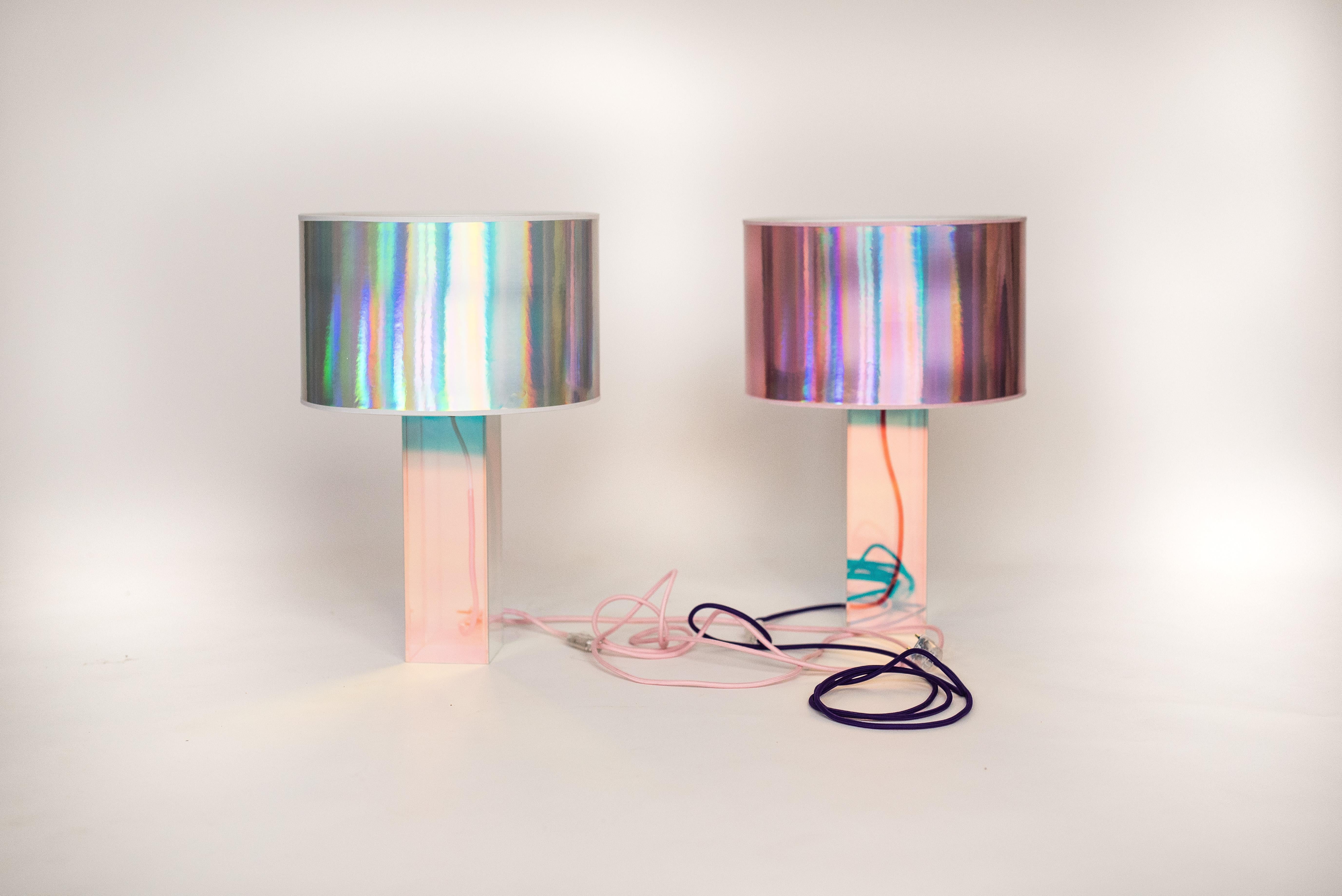 Kinetic colors table lamp by Brajak Vitberg
Materials: plexiglass, dichroic film
white or black cotton lampshade, cotton wiring
Dimensions: 52 x 35 x 35 cm

Bijelic and Brajak are two architects from Ljubljana, Slovenia.
They are striving to design