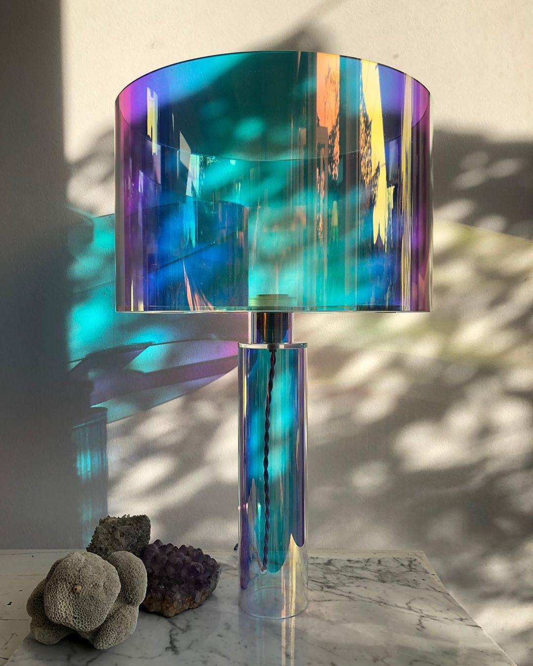 Kinetic colors table lamp by Brajak Vitberg
Materials: plexiglass + dichroic film
white or black cotton lampshade, cotton wiring
Dimensions: 55 x 35 x 35 cm

Bijelic and Brajak are two architects from Ljubljana, Slovenia.
They are striving to