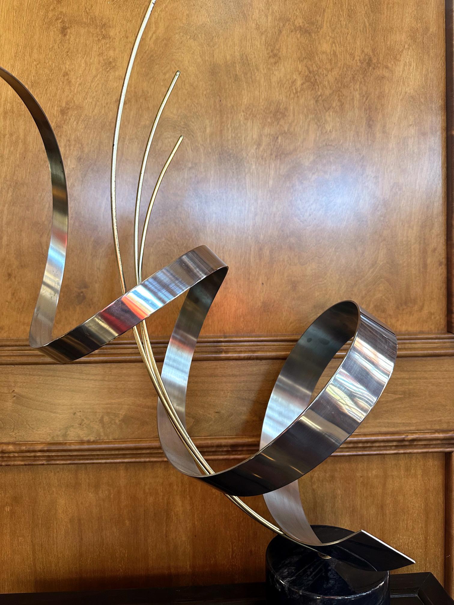 Stainless Steel Kinetic Metal Sculpture on Marble Base by C. Jere For Sale