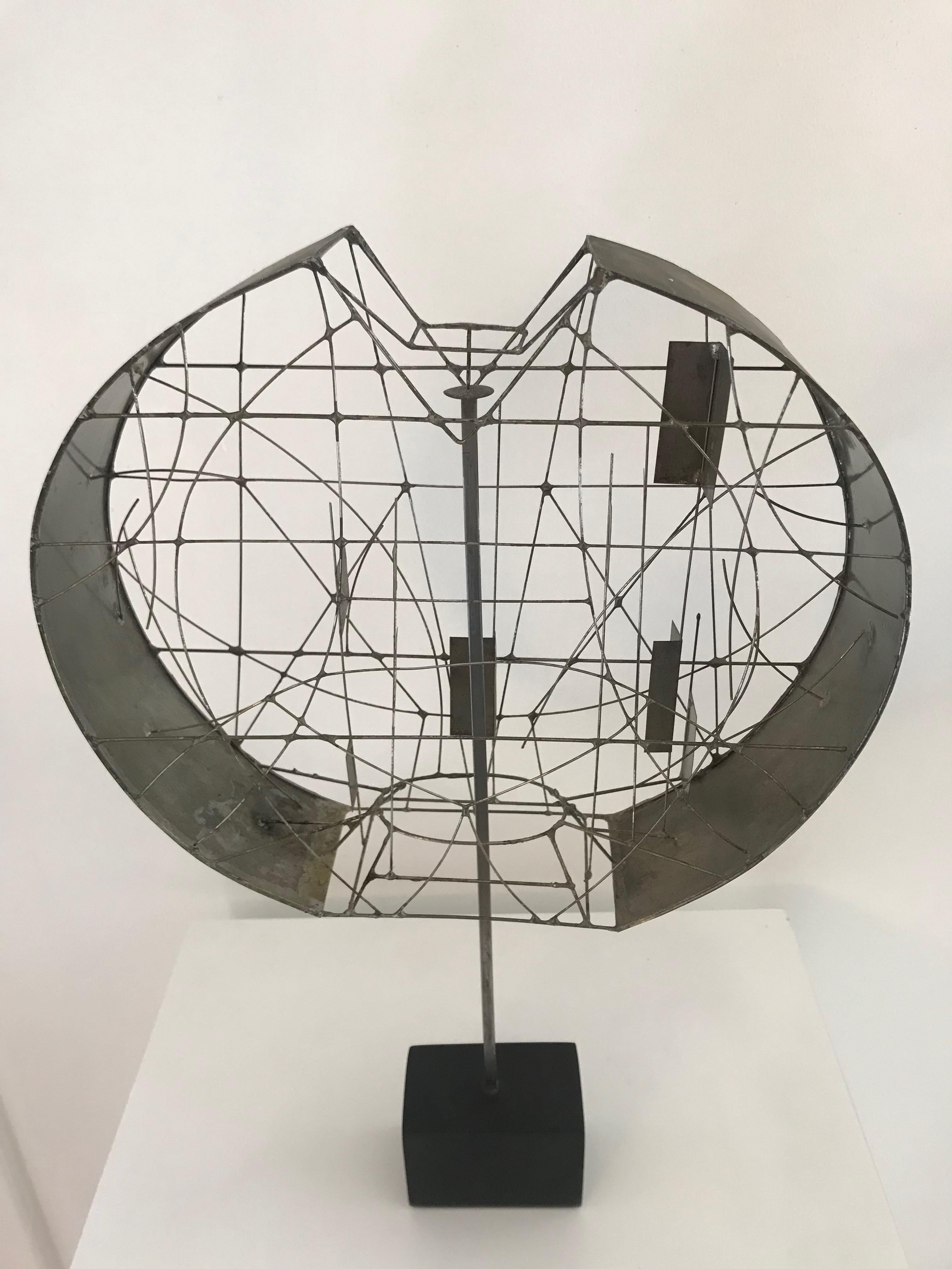 Nice piece of modern art. 
Studio made. 
One off. 
It rotates around the stem and moves side to side.
Illegibly signed with the year 1969.
Great as a decorative art object on a credenza or pedestal.

