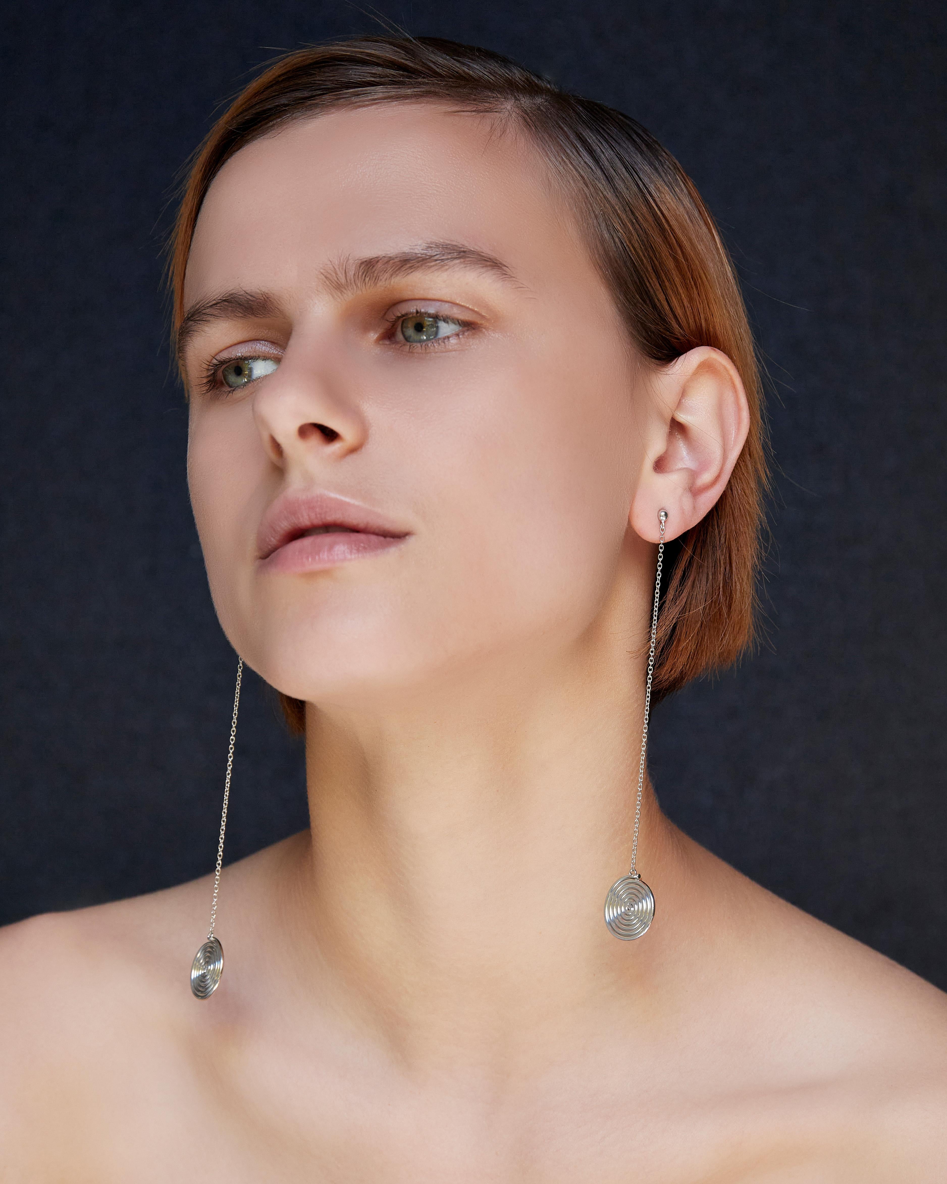 BAR Jewellery, London UK, NEVERENDING ROAD EARRINGS, Sterling Silver 

The Neverending road earrings are a playful drop style, inspired by the work of artists Terry Frost and Alexander Calder. These earrings are best worn with the hair tied back