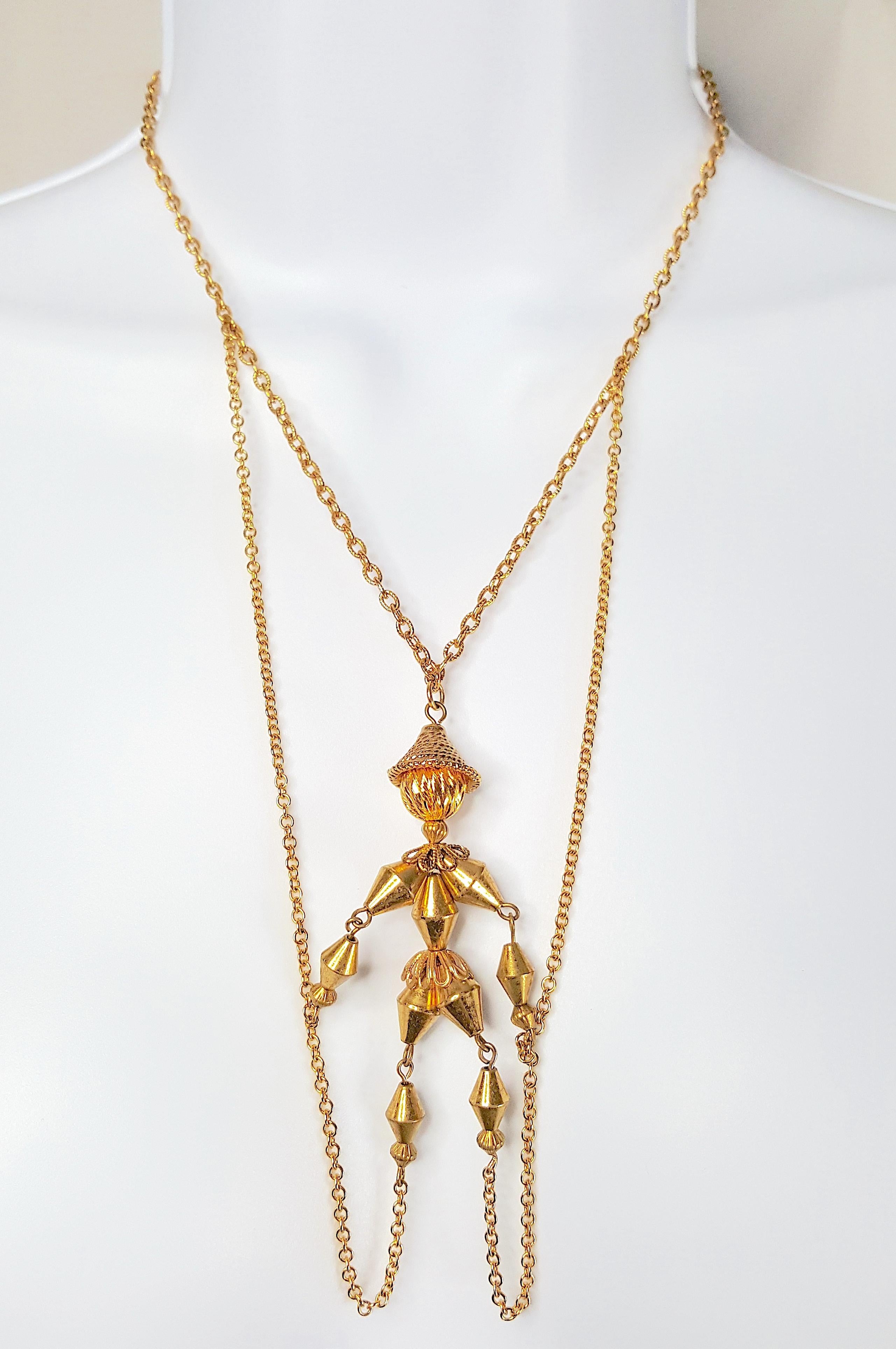 Acquired in The States and likely inspired by the American 1938-commissioned animated-feature movie, Pinocchio, that was produced for two years by Walt Disney based on an Italian children's story, this unsigned pre-WWII yellow-gold-gilt brass