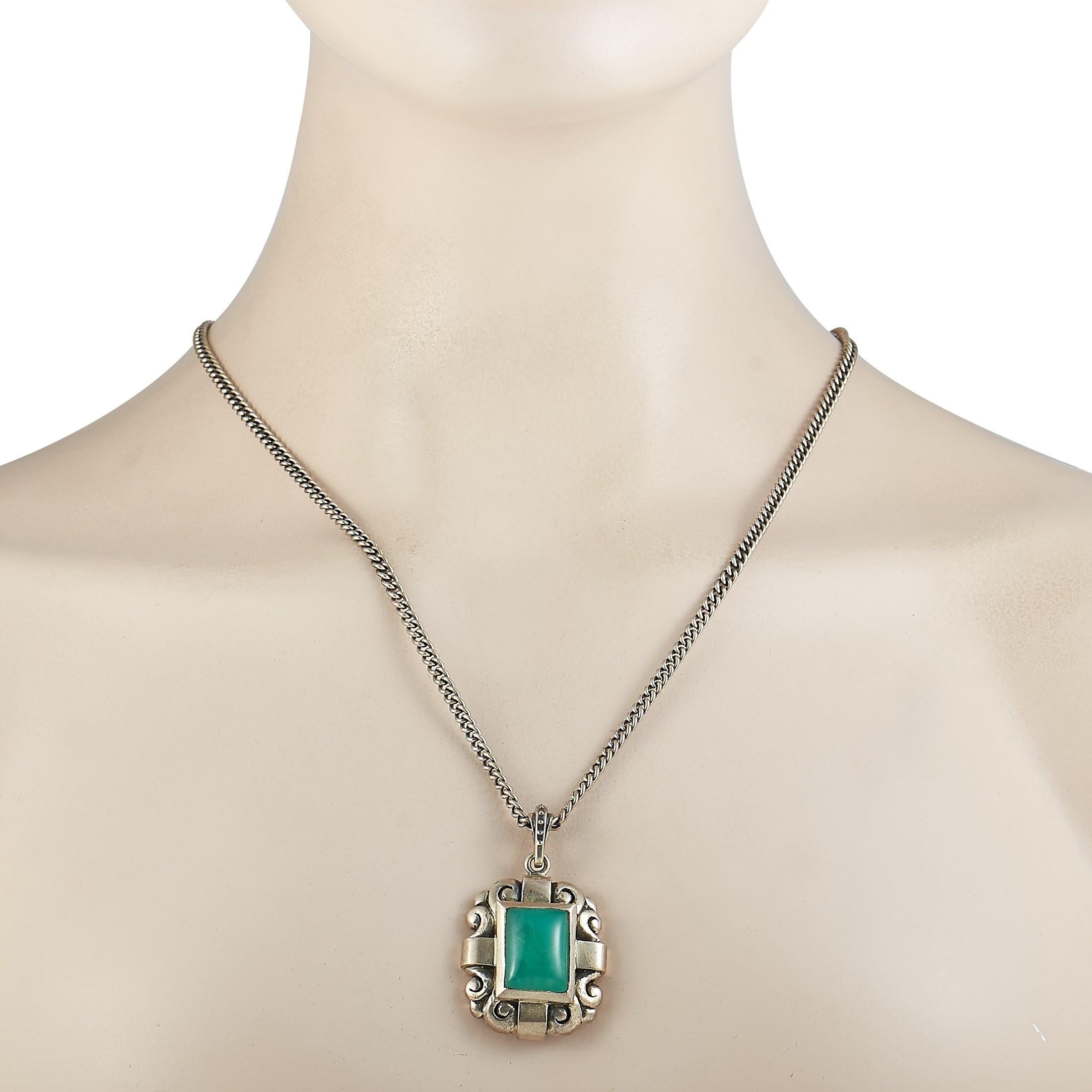 This King Baby necklace is crafted from silver and weighs 54.2 grams. The necklace is presented with a 22” chain onto which a 2” by 1.25” pendant is attached, set with chrysoprase.

Offered in brand-new condition, this item includes the