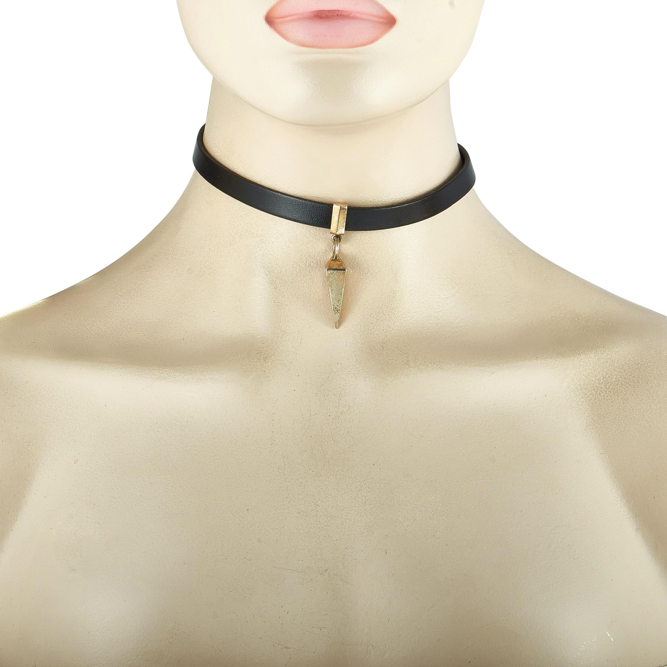 This King Baby choker necklace is made out of sterling silver and black leather. It weighs 27.2 grams and measures 12” in length, while the pendant measures 1.75” by 0.30”.

Offered in brand new condition, this item includes the manufacturer’s pouch.