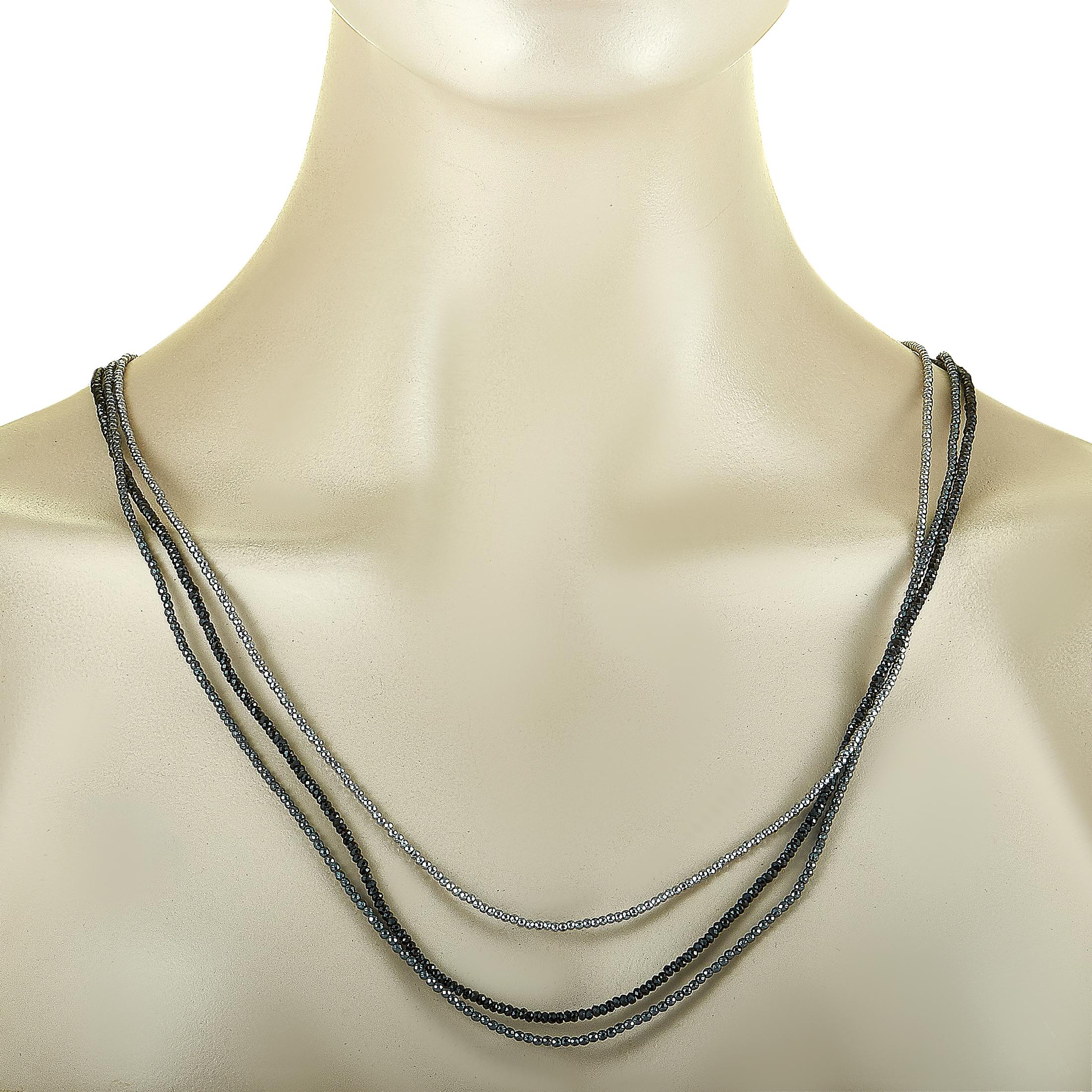 This King Baby multistrand necklace is made out of sterling silver and spinels and weighs 33.8 grams, measuring 32” in length.

Offered in brand new condition, the necklace includes the manufacturer’s pouch.