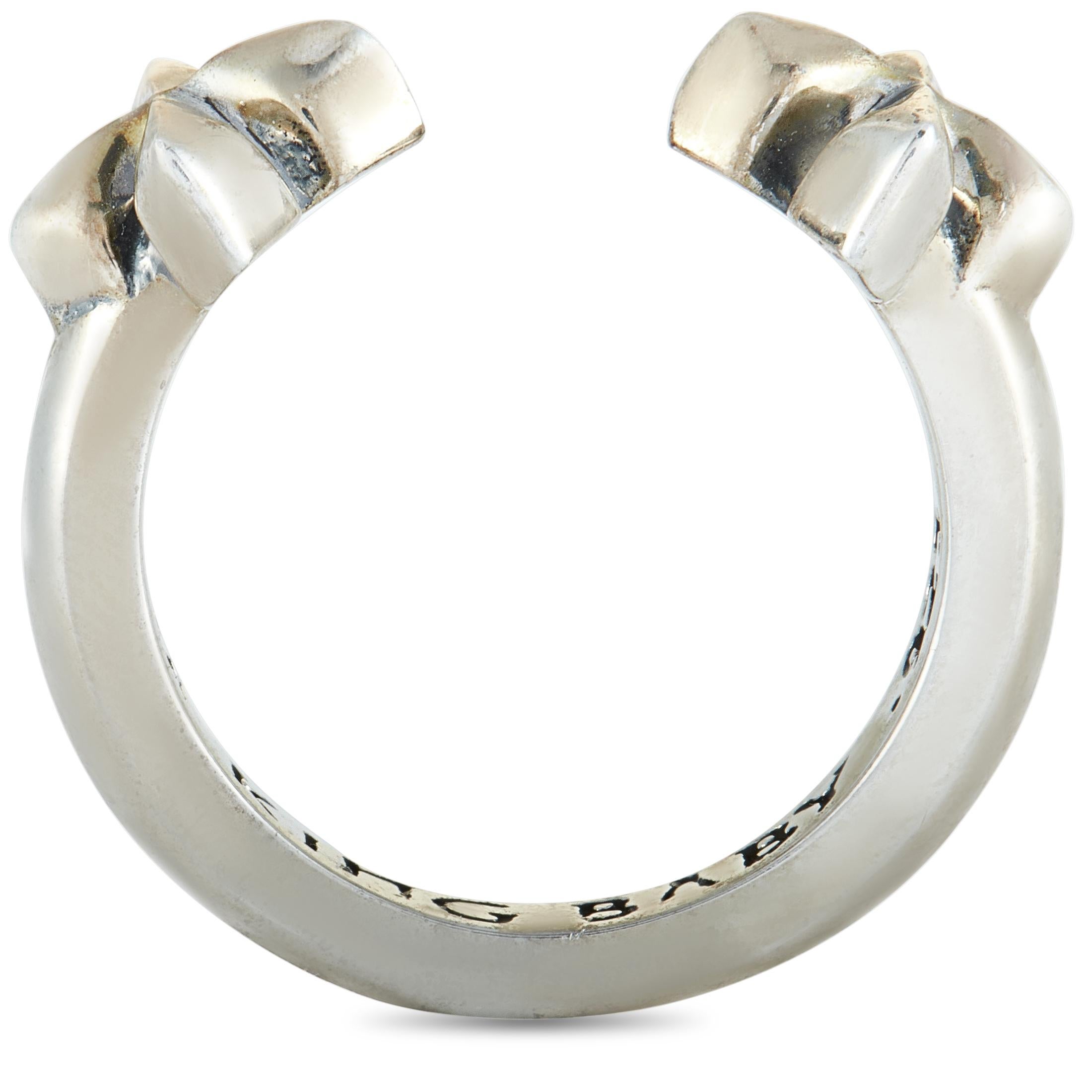 This King Baby open ring is crafted from sterling silver and weighs 4.9 grams. The ring boasts band thickness of 3 mm and top height of 4 mm, while top dimensions measure 22 by 8 mm.

Offered in brand new condition, this item includes the
