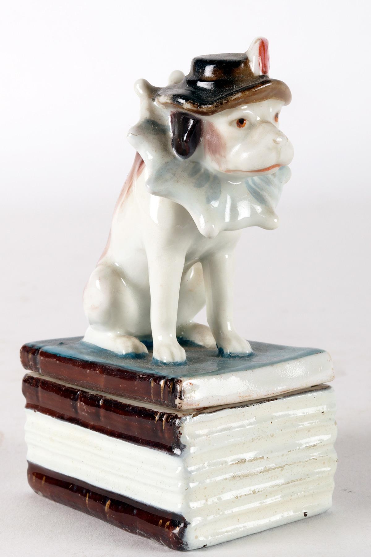 Porcelain King Charles Cavalier porcelain box, sitting on the books, England 1850. For Sale