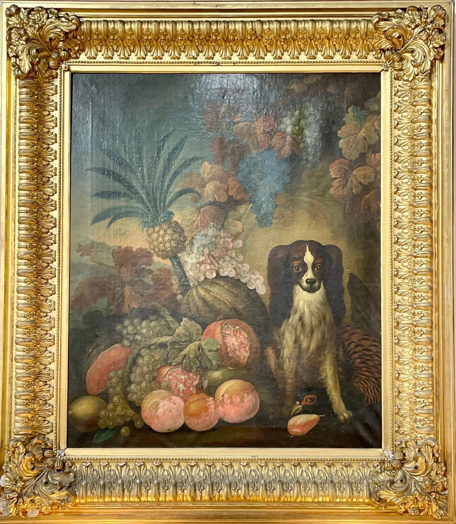 Continental School, 18th-19th Century charming painting of a King Charles Spaniel beside tropical fruit, having a fine gilded frame.

