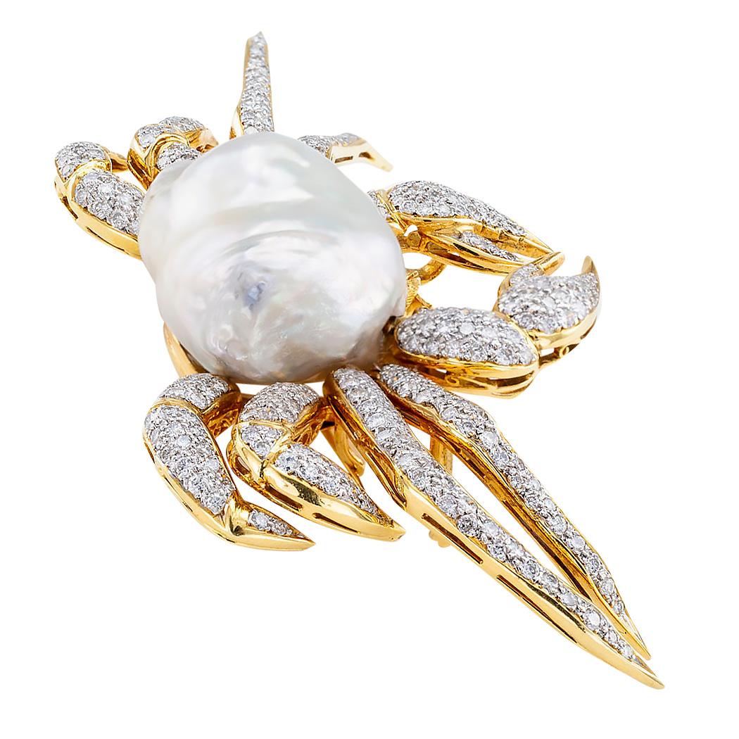 Diamond freshwater pearl and gold king crab brooch pendant circa 1980.

DETAILS:

DIAMONDS:  three hundred round brilliant-cut diamonds totaling approximately 5.50 carats, approximately H – I color, SI – I clarity.

PEARL:  one Extra Large Baroque