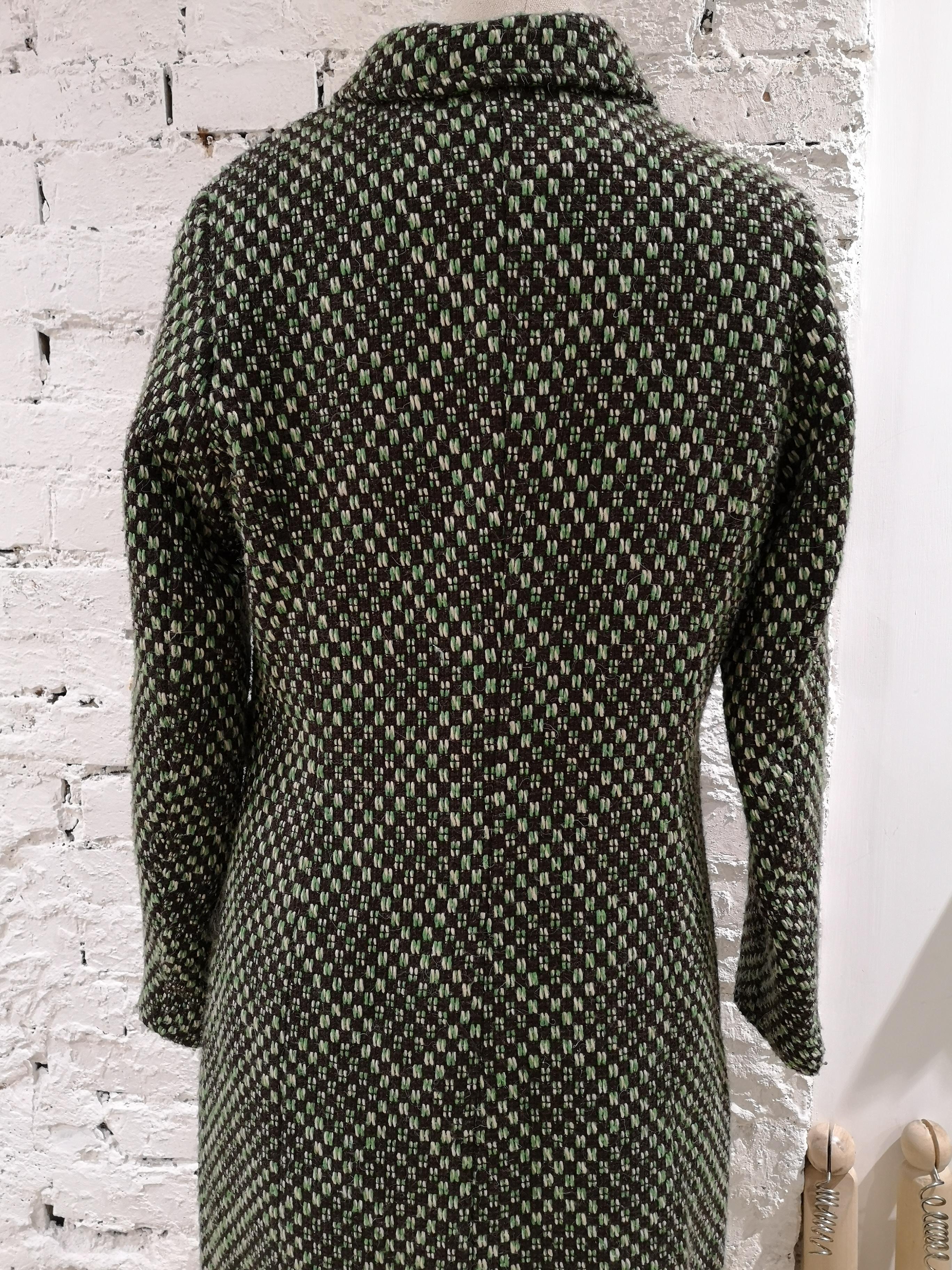King Louie green wool coat
green multicoloured coat totally made in italy in size FR 36
total lenght 94 cm
shoulder to hem 61 cm
