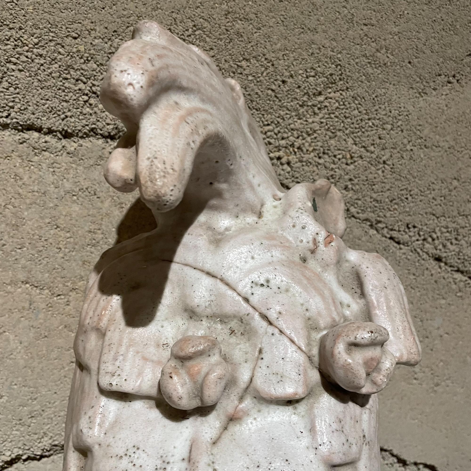 mayan statue head
