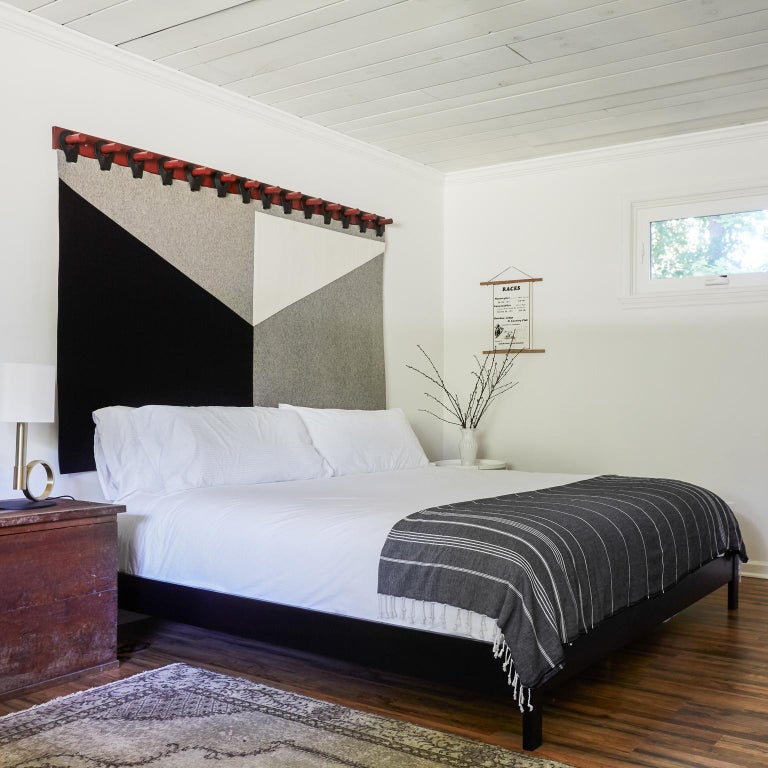 King Range Wall Tapestry Headboard by Moses Nadel in black, cream and