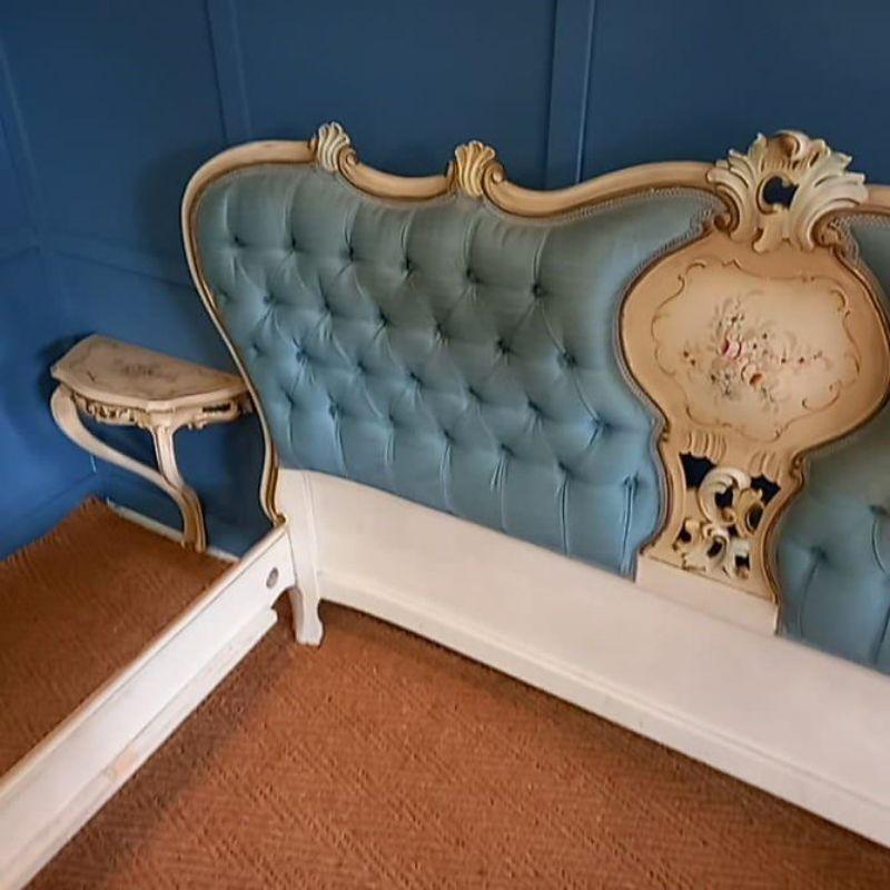 upholstered bed frame with bedside tables