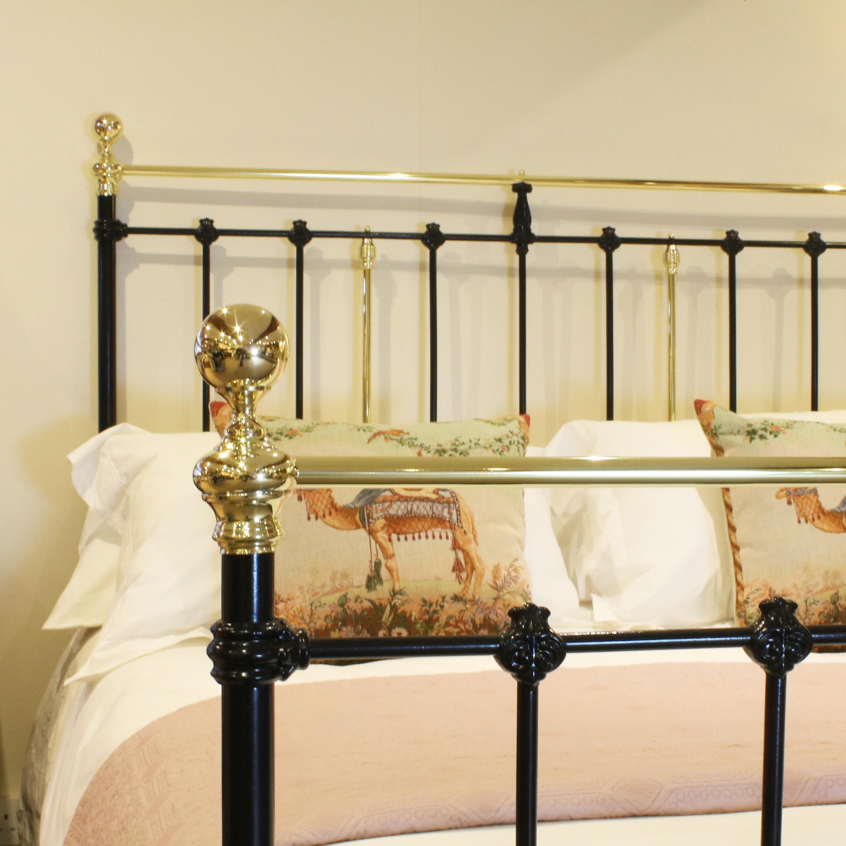 King size brass and iron bed finished in black with decorative castings and straight brass top rail.

The price is for the bed frame alone. The base, mattress, bedding and linen are extra and can be supplied.