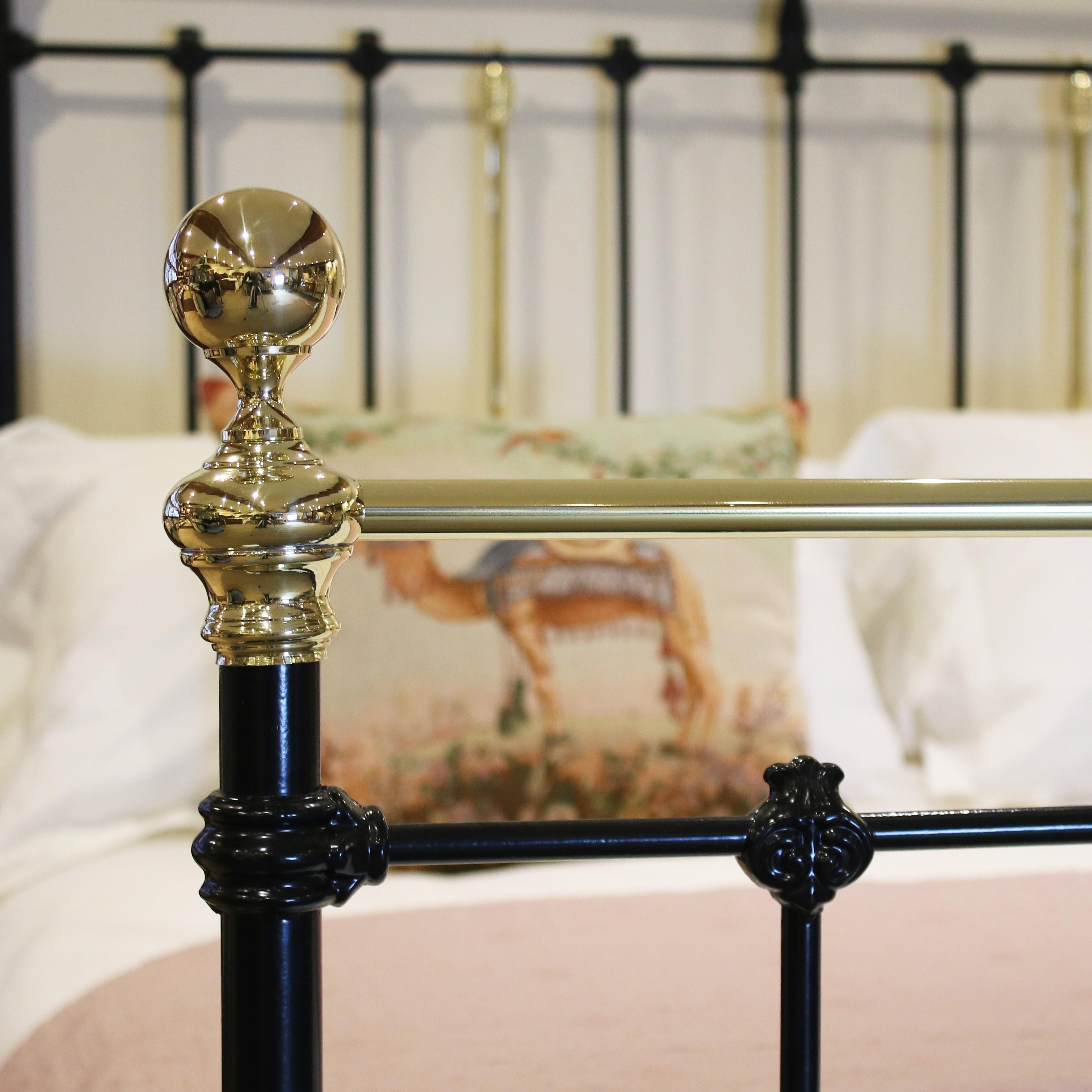 black and brass bed