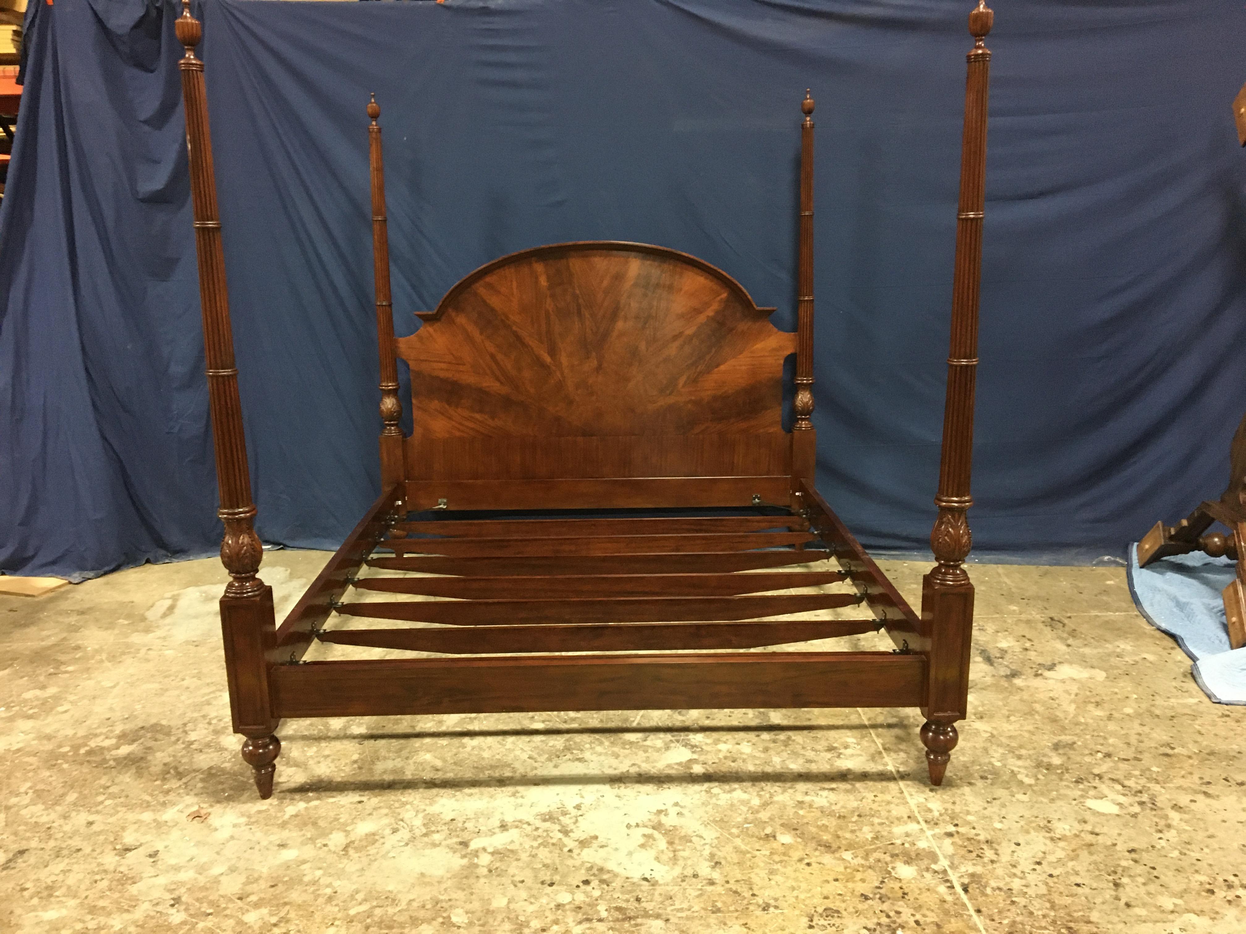 This is a new traditional king size mahogany poster bed by Leighton Hall Furniture. It’s design was inspired by traditional poster beds from the past and features hand carved fluted posts and a radial cut crotch mahogany headboard.

Approximate