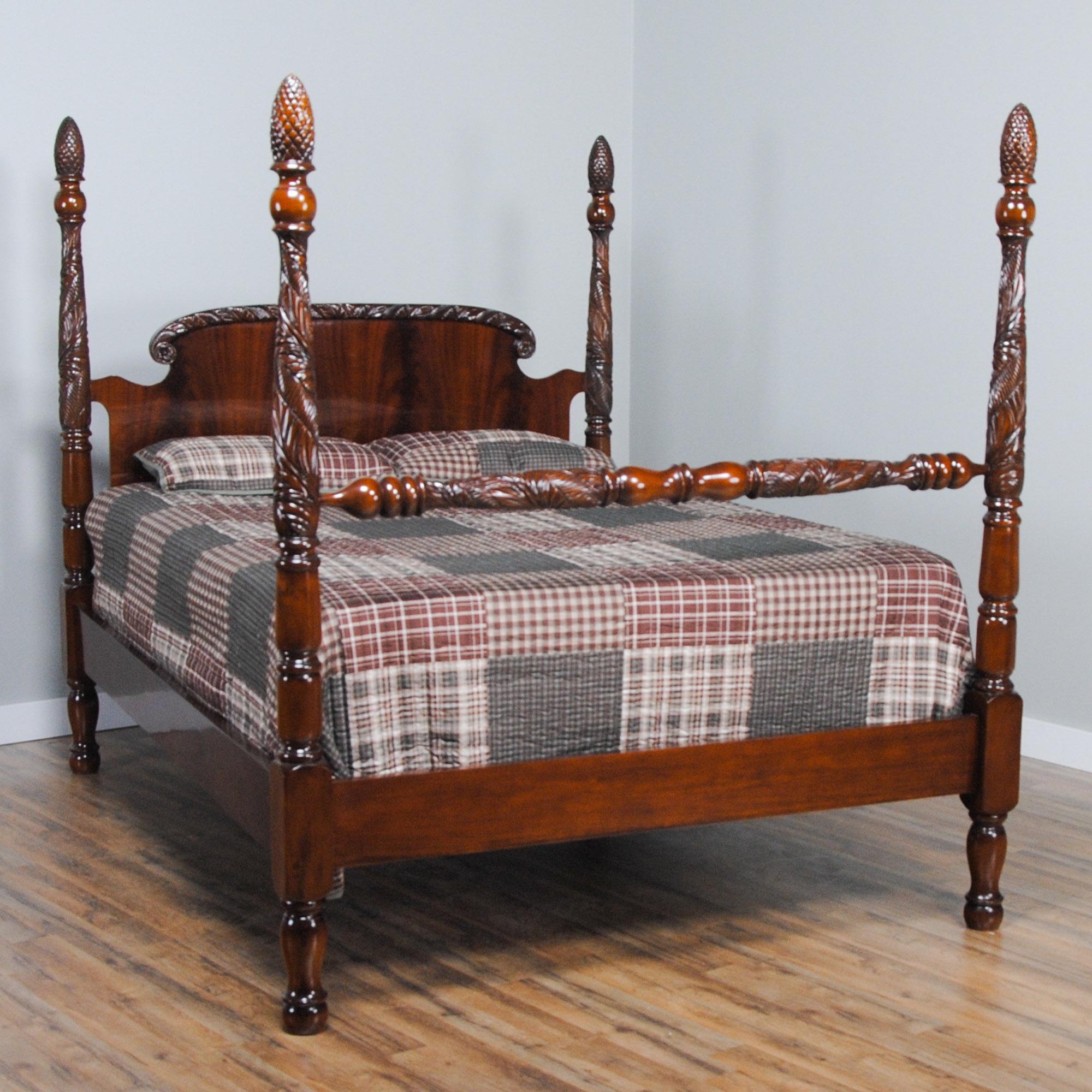 A King Size Mahogany Poster Bed. A Solid Mahogany Frame and the finest mahogany veneered headboard panel combine together to create a beautiful and elegant bed suitable to be the center of attention in any bedroom. The carved posts feature stylized