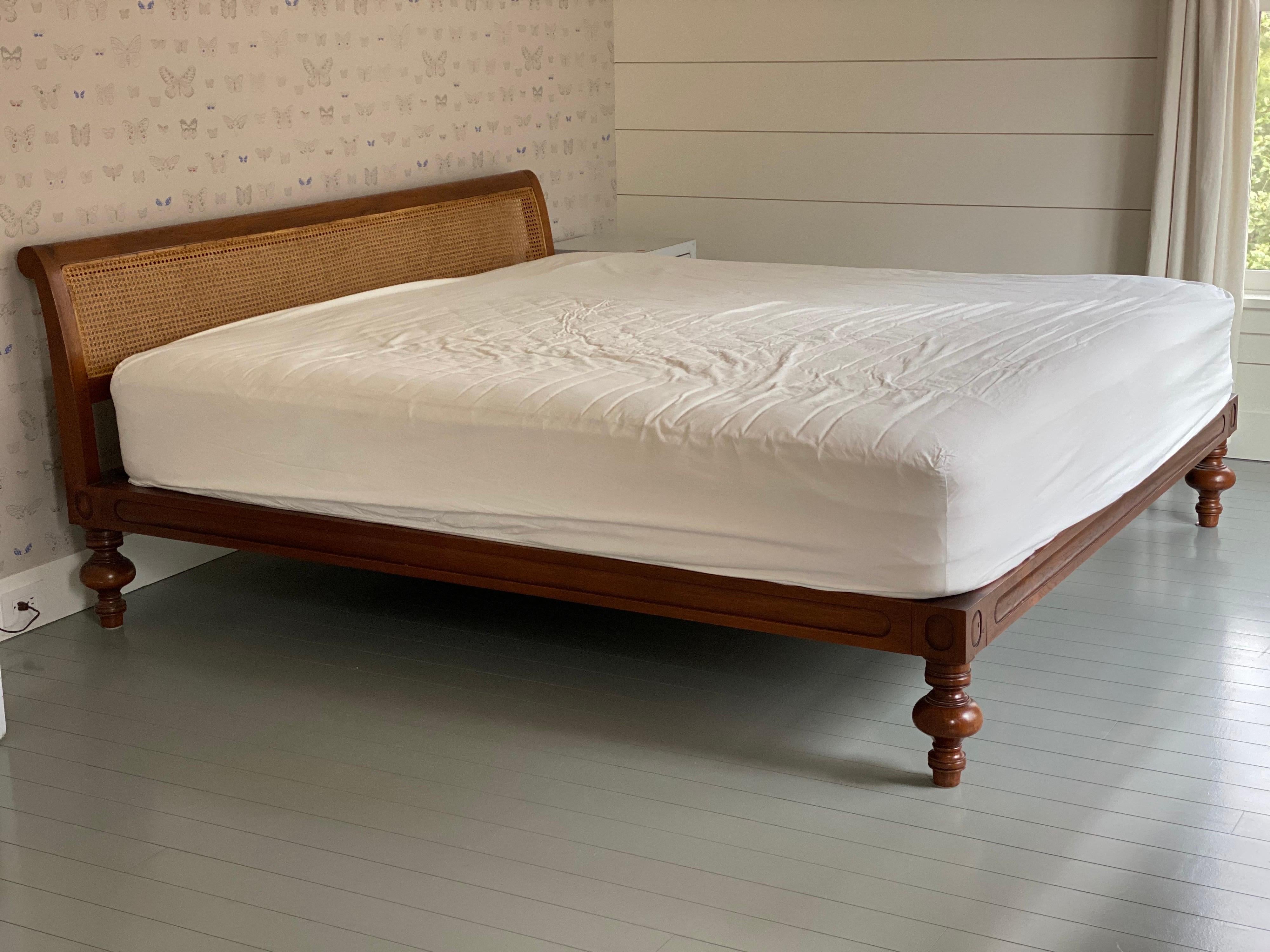 King size teak & caned back bed frame by British Khaki
British Colonial style design in teak and hand-caned headboard. Clean and classic style bed frame.
Teak frame, headboard and wood slats make seven separate pieces. Mattress not included.