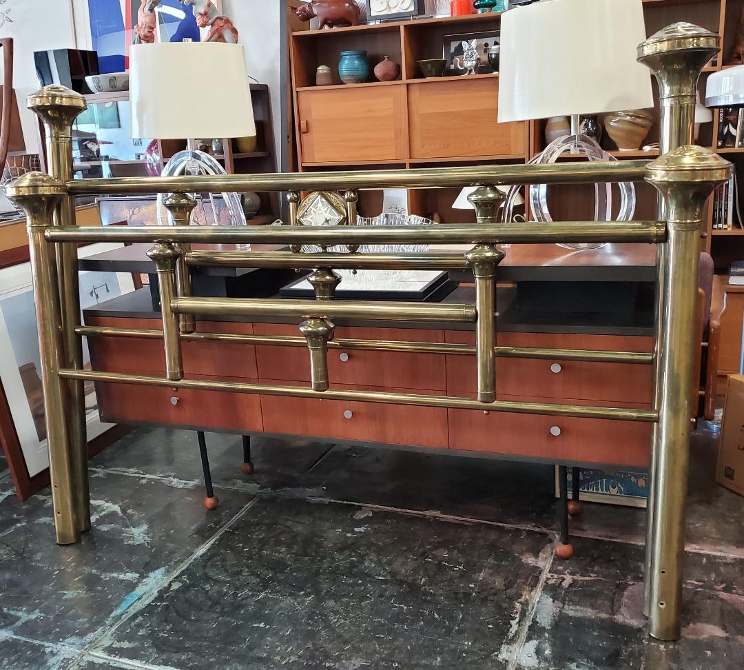 1960s King Size Vintage Brass Bed Frame With Large Decorative Medallion Accent Formally Owned by Actor Lee Marvin.
 
Gorgeous King Size Brass Bed Frames (Head and Foot Frame) Has Large Solid Brass Finials And A Large Brass, Glass And Intricate