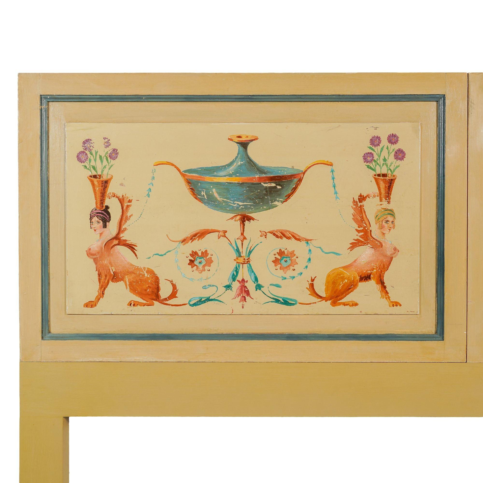 Pair of architectural feather edge panels painted in the Pompeiian taste. The panels each feature a pair of mythical creatures which are a hybrid between a griffin and a female centaur. These conceits were part of a suite of decorative architectural