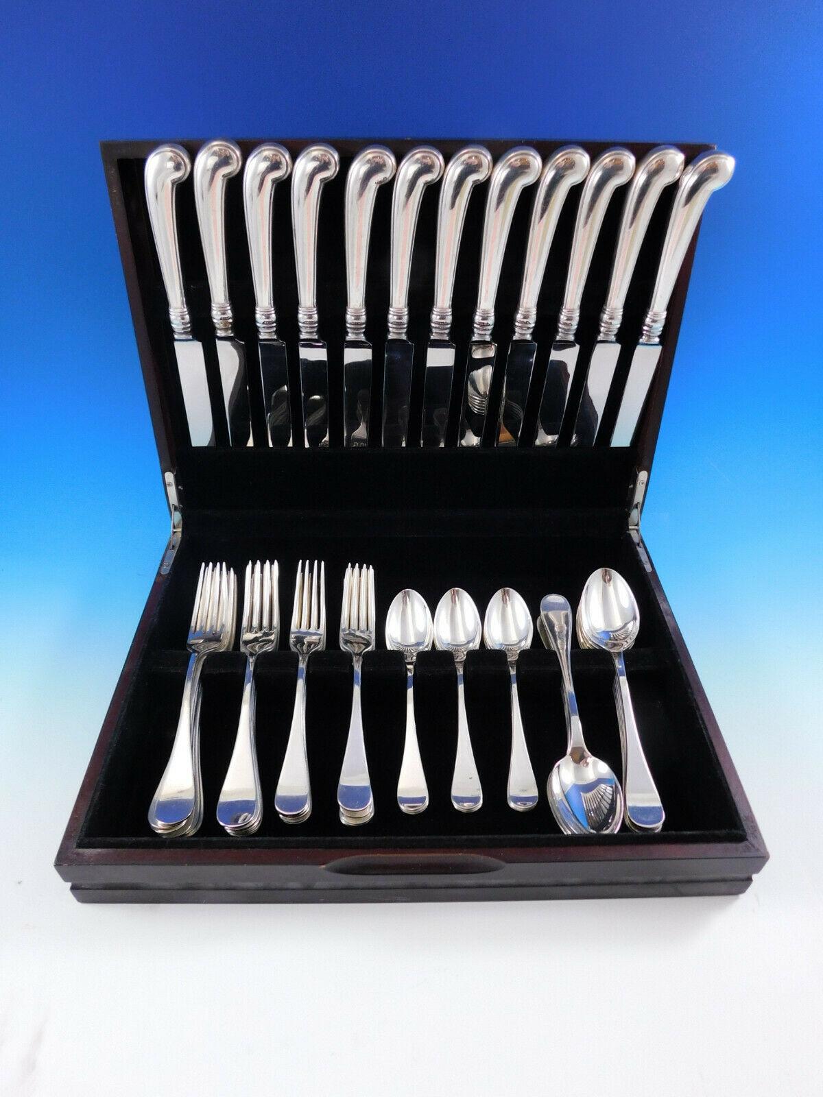 Outstanding Dinner Size King William by Tiffany and Co. sterling silver flatware set, 60 pieces. This old English style pattern was introduced in the year 1870. The pieces are large and heavy, with fabulous pistol grip handle knives. This set