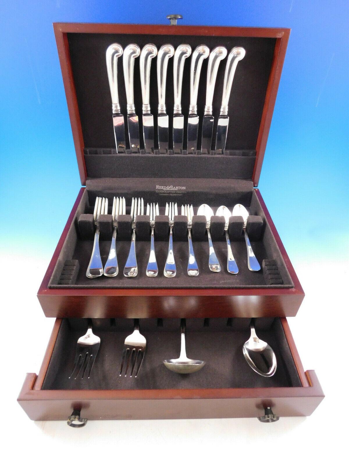 Dinner size King William by Tiffany and Co. sterling silver Flatware set, 36 pieces. This Old English style pattern was introduced in the year 1870. The pieces are large and heavy, with wonderful pistol grip handle knives. This set includes:

8