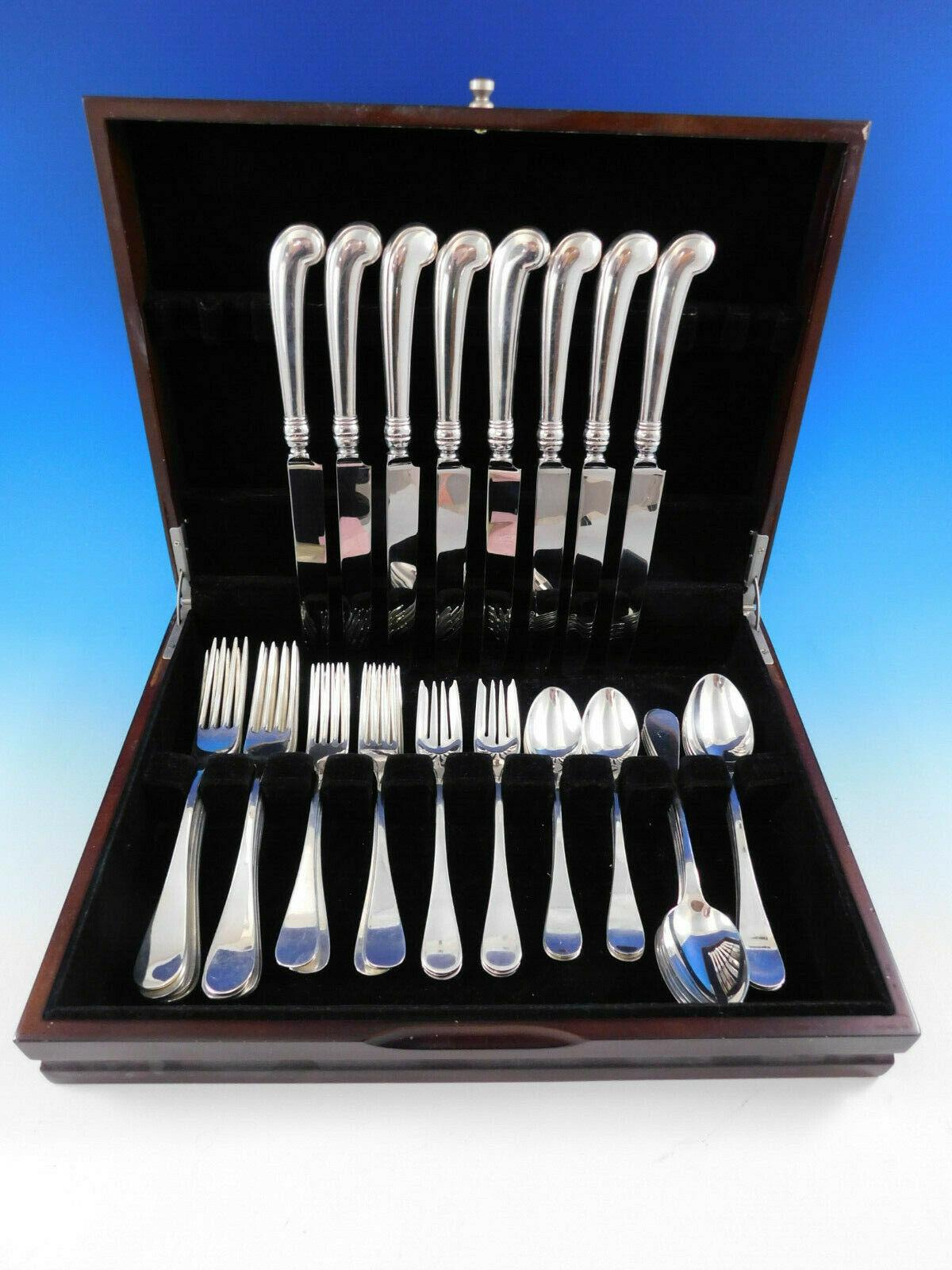 King William by Tiffany & Co. sterling silver flatware set, 48 pieces. This Old English style pattern was introduced in the year 1870. The pieces are large and heavy, with wonderful pistol grip handle knives. This set includes:

8 large dinner size