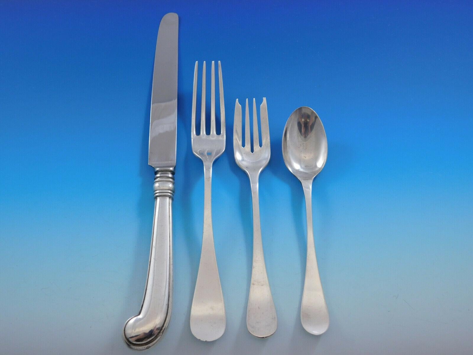 Superb King William by Tiffany & Co. sterling silver flatware set, 84 pieces. This Old English style pattern was introduced in the year 1870. The pieces are large and heavy, with wonderful pistol grip handle knives. This set includes:

8 dinner size