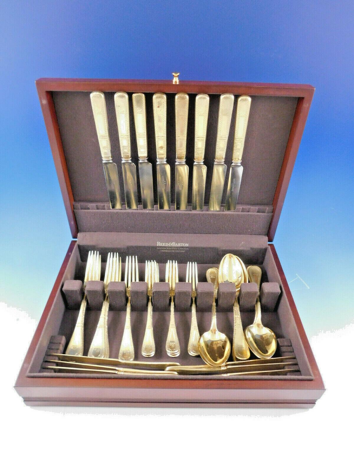 Dinner size King William Engraved Vermeil by Tiffany & Co. sterling silver flatware set of 88 pieces. This set is vermeil (completely gold-washed) and includes:

8 dinner size knives w/blunt stainless blades, 10 3/4