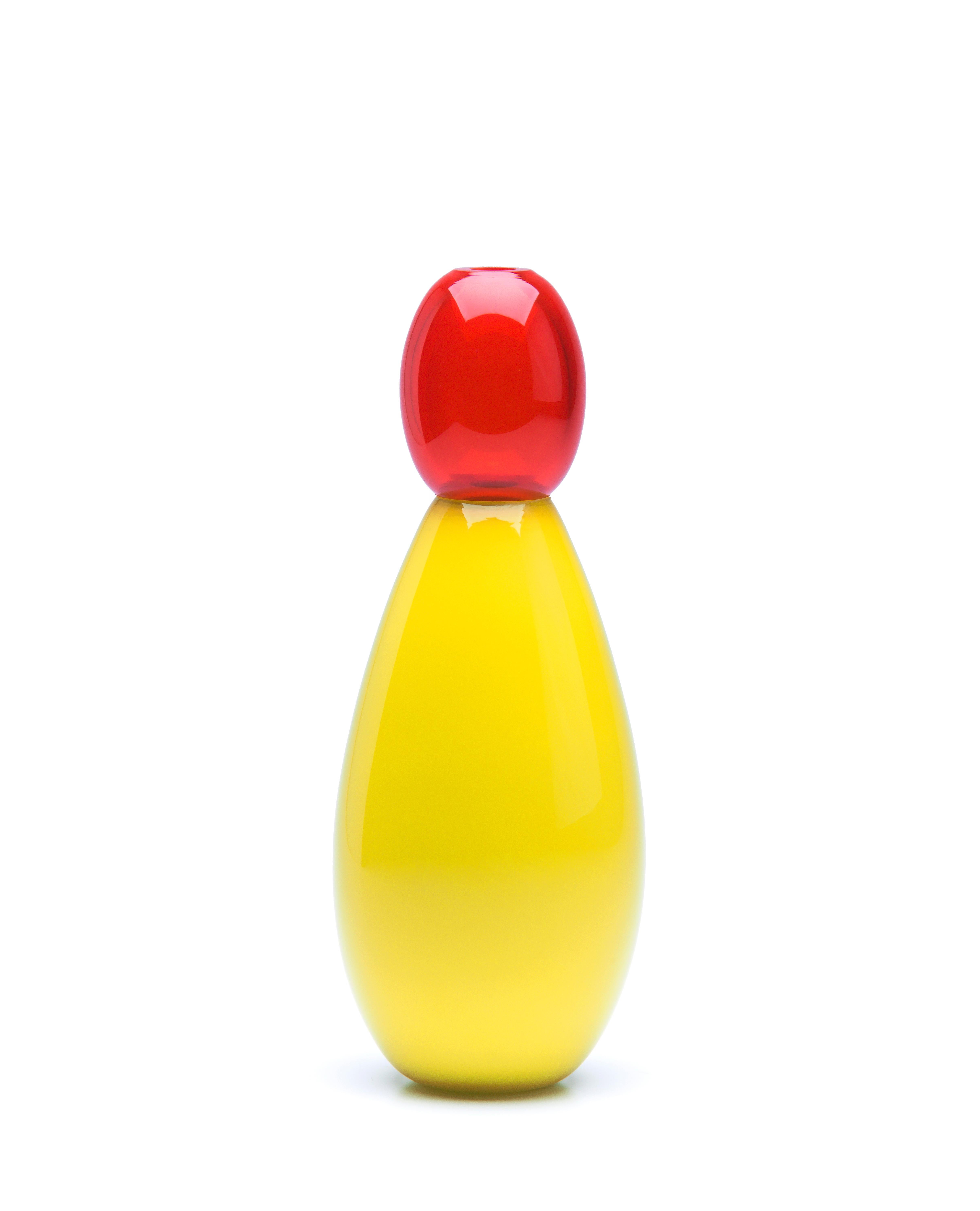 King yellow vase by Purho
Dimensions: D20 x H40 cm
Materials: Glass
Other colors and dimensions are available.

Purho is a new protagonist of made in Italy design, a work of synthesis, a research that has lasted for years, an Italian soul and
