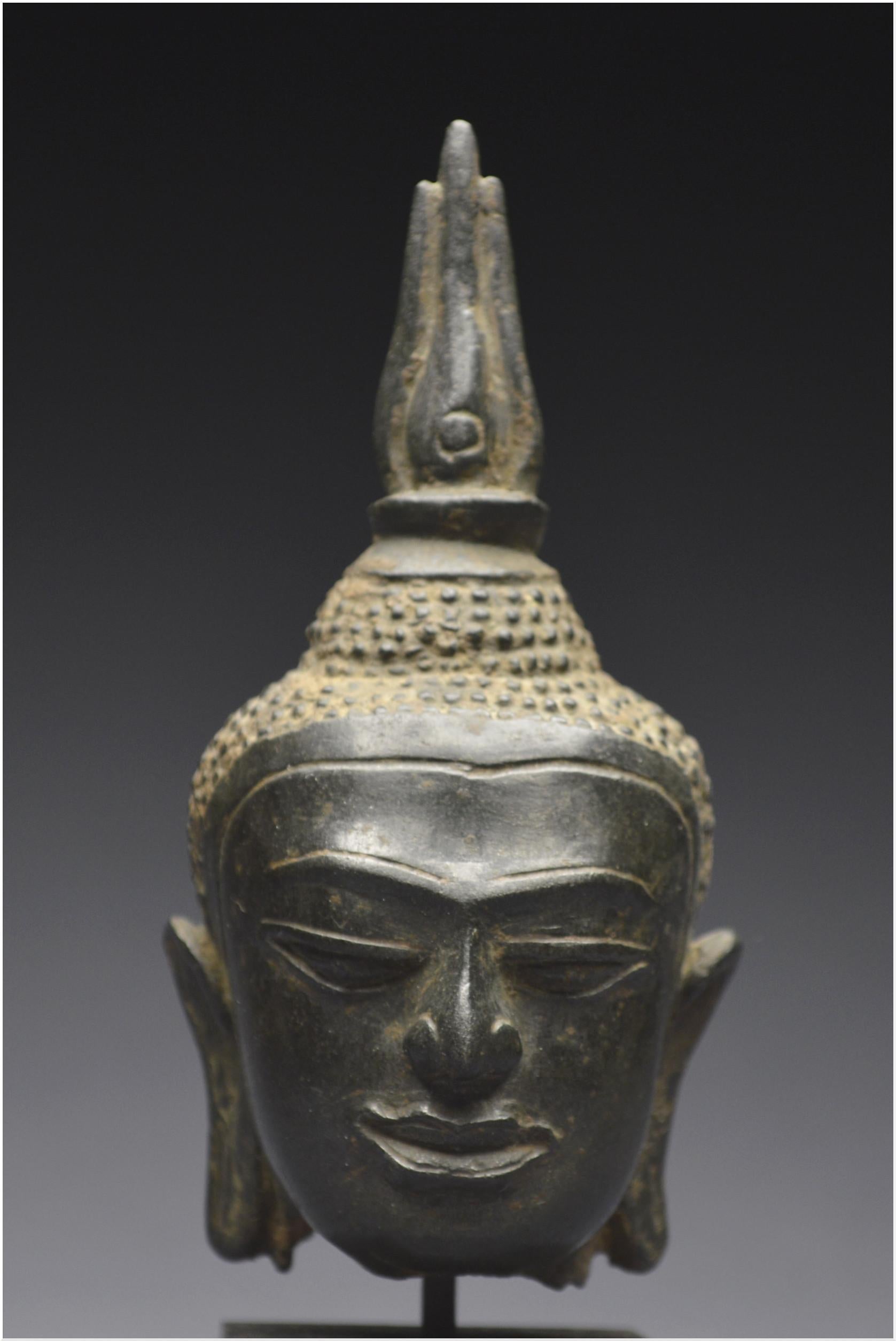 Thai Kingdom of Siam, 14th - 15th century, U-Thong style, Small bronze Buddha head 