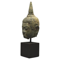 Kingdom of Siam, 16th - 17th Century, Northern school, Small bronze Buddha head 