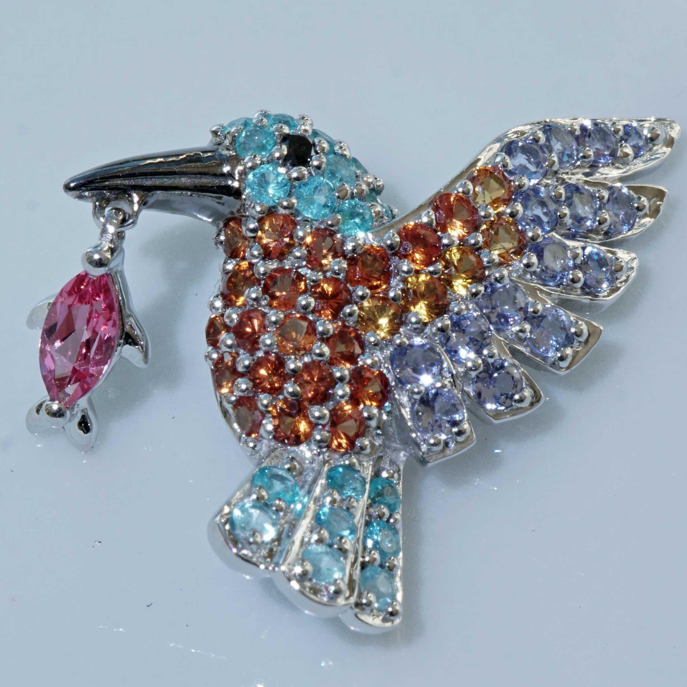 which gemstones are suitable for a kingfisher, actually only the most extravagant in the color world of gemstones the paraiba tourmaline and spinel, small bird with movable pink spinel marquise depicted as a fish, approx. 21.5 x 17, 5 x 5 mm, pavee