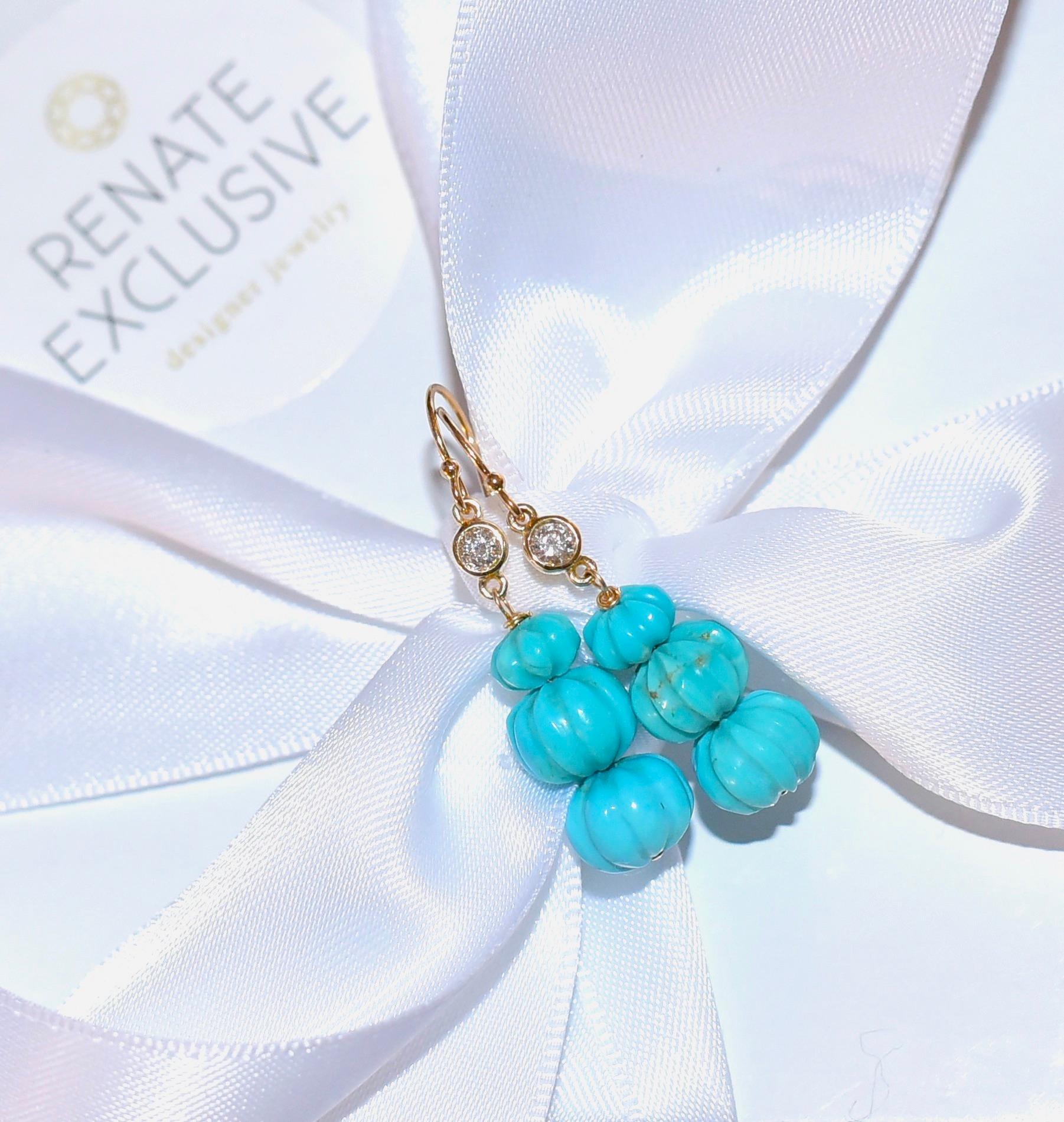 These precious earrings were created from Kingman Turquoise and look at the fun part because they look like melon! The earring strikes a special shine genuine 14K solid yellow gold diamond bezel connector with 0.10 carat white diamonds. 
Beautiful