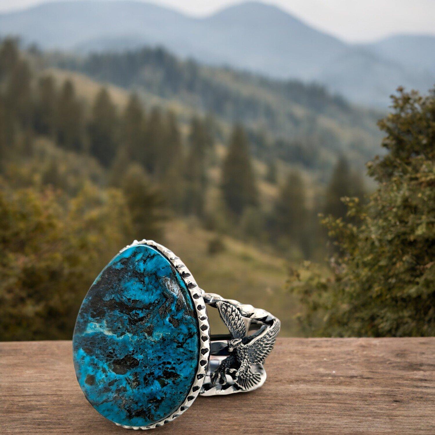 Artisan Kingman turquoise cabochon is encircled by hand-sculpted bezels, collage of blue For Sale