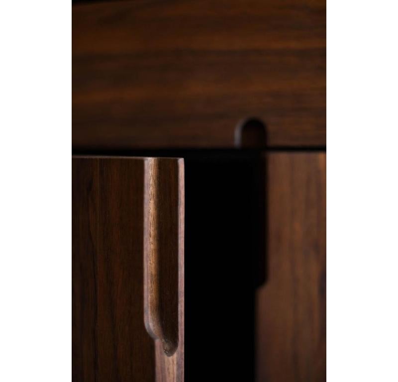 The Kings Nighstand is handmade locally in Los Angeles, California. A simple combination of natural material and modern design, Nighstand fits nearly any aesthetic. The modern, matte black casing of the piece's exterior highlights the beautiful