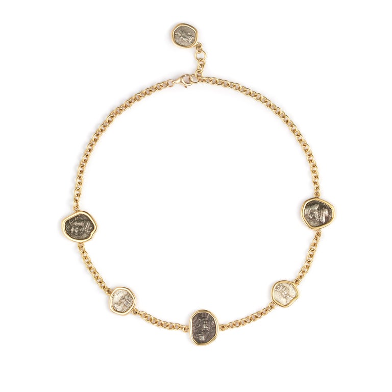 This DUBINI coin choker from the 'Empires' collection features an authentic hemidrachm coins of Kings of Persis circa 1st century B.C. set in 18kt yellow gold.

Coin History
Home to the Persians, the principality of Persis emerged in the 8th century