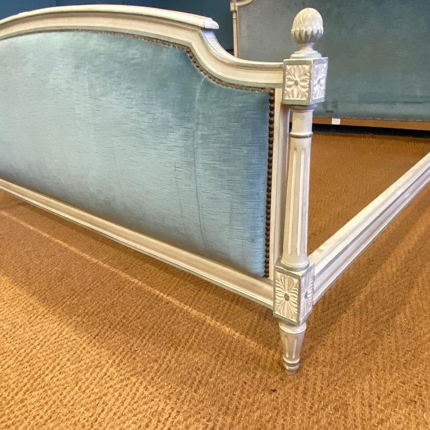 Large king size 5’6” Louis XV1 Style French upholstered bed frame with pretty bed knobs and columns. The frame has a flat head and foot end so it should accept a standard 5’6 wide mattress. The bed will be fully restored and the frame will be