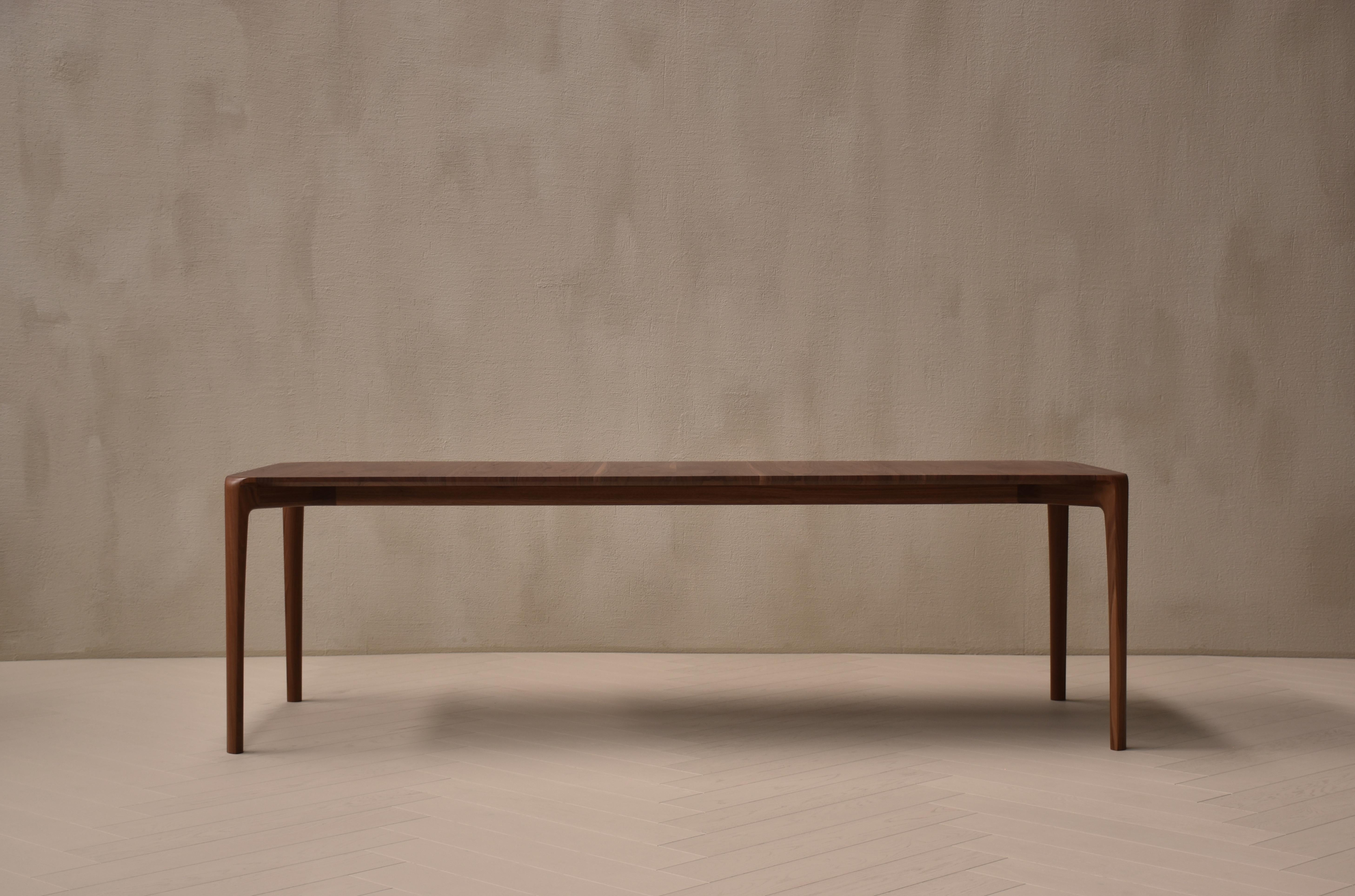 Kingston Dining Table by Daniel Poole
Dimensions: D 90 x W 240 x H 74 cm. 
Materials: American Back Walnut with 10% gloss lacquer.

This table includes a certificate of authenticity. Please contact us. 

Daniel Poole PL is a bespoke furniture design