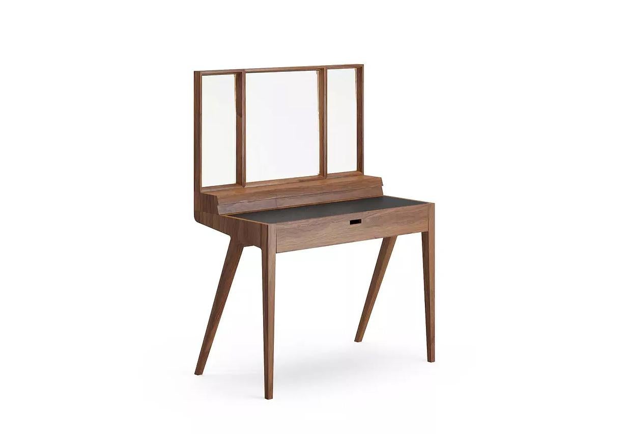 Kingston dressing table by Dare Studio, 2014
Dimensions: H 140 cm (with mirror), D 57.5 cm, W 100 cm
Materials: American black walnut, black leather

Also available in waxed oil timber finish, optional bi-fold mirror. 

Dare Studio is a