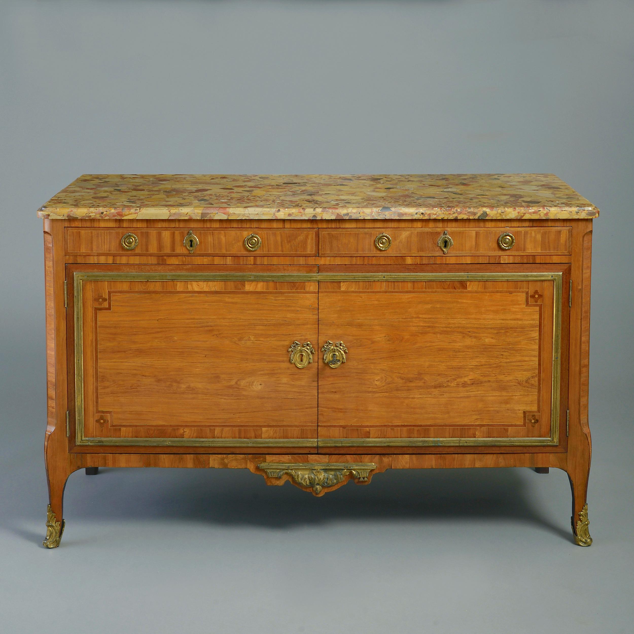 A fine Louis XVI ormolu-mounted kingwood and amaranth commode by Claude-Charles Saunier, with original Brêche d’Alep top, circa 1775.

Stamped C C SAUNIER JME.