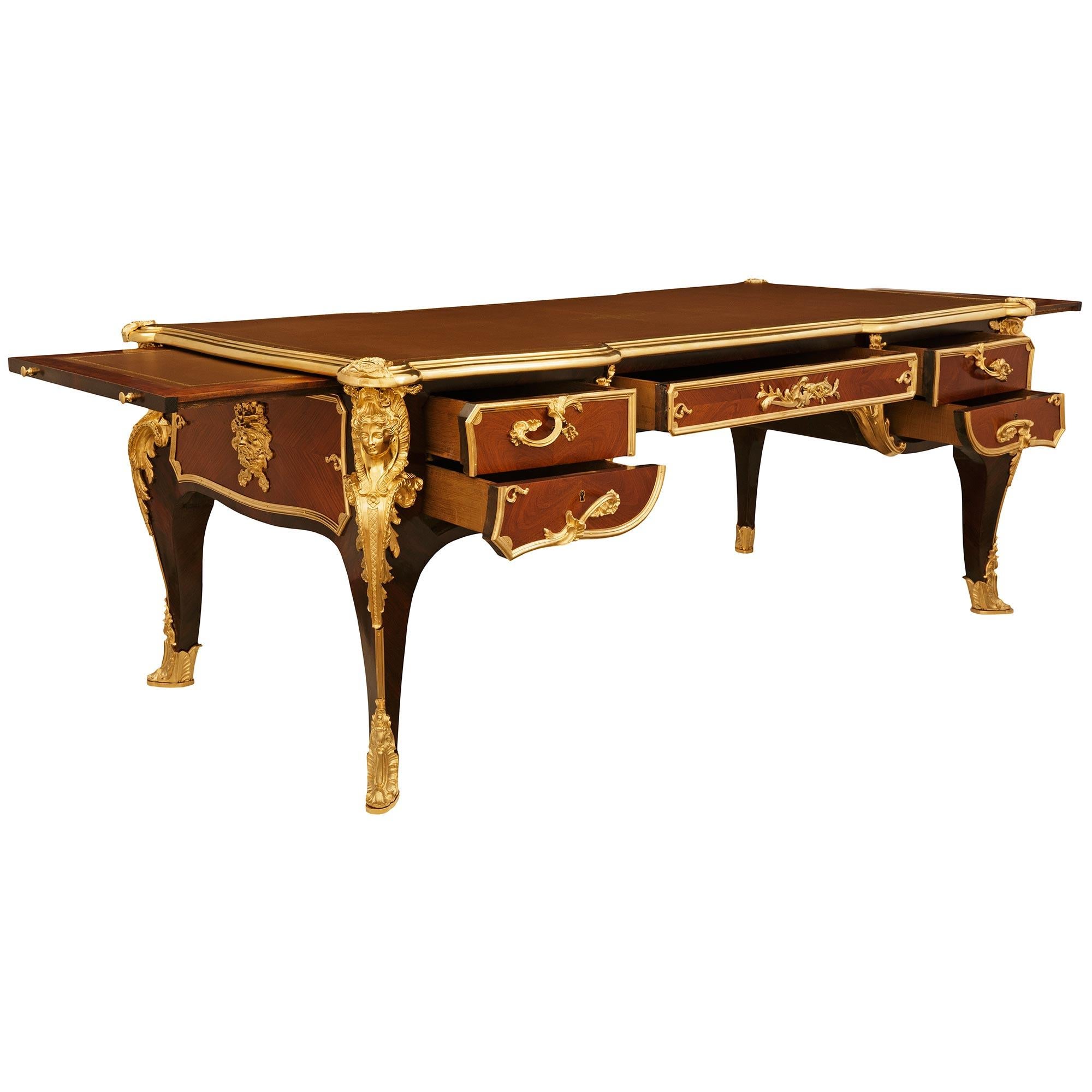 French Kingwood, Tulipwood and Ormolu desk, modeled after Charles Cressent For Sale