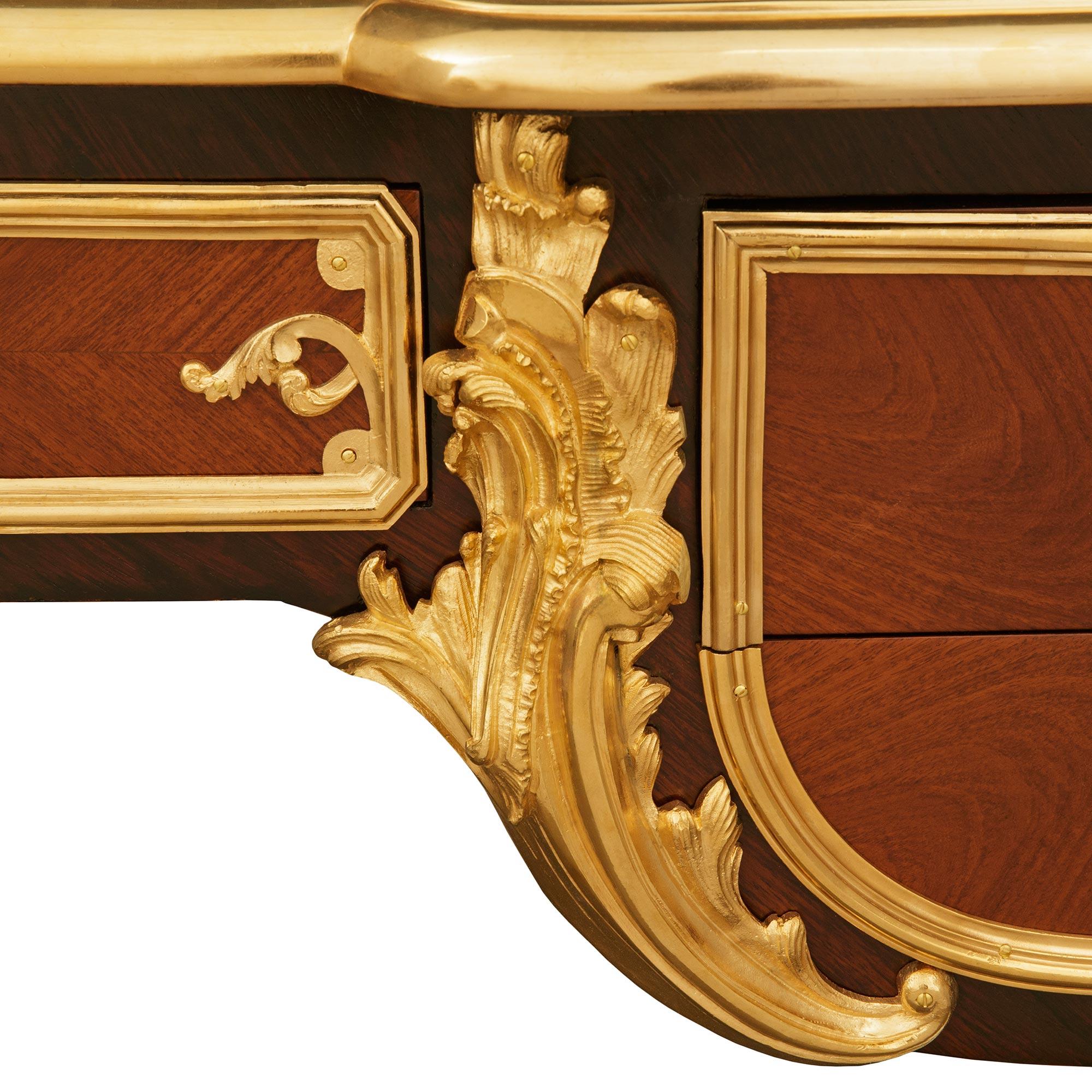 Kingwood, Tulipwood and Ormolu desk, modeled after Charles Cressent For Sale 1