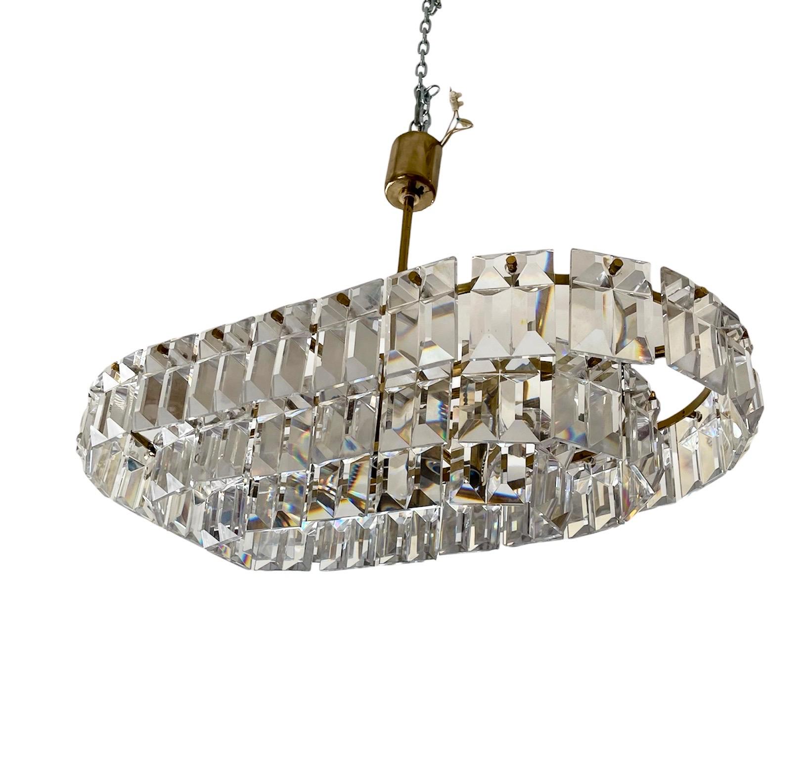 Exceptional Kinkeldey chandelier with large glass. The Design and the quality of the glass make this piece the best of the Austria Design.

This unique Kindeldey glass chandelier in cristal glass are exceptional.

This Pieces of Arts glass show the