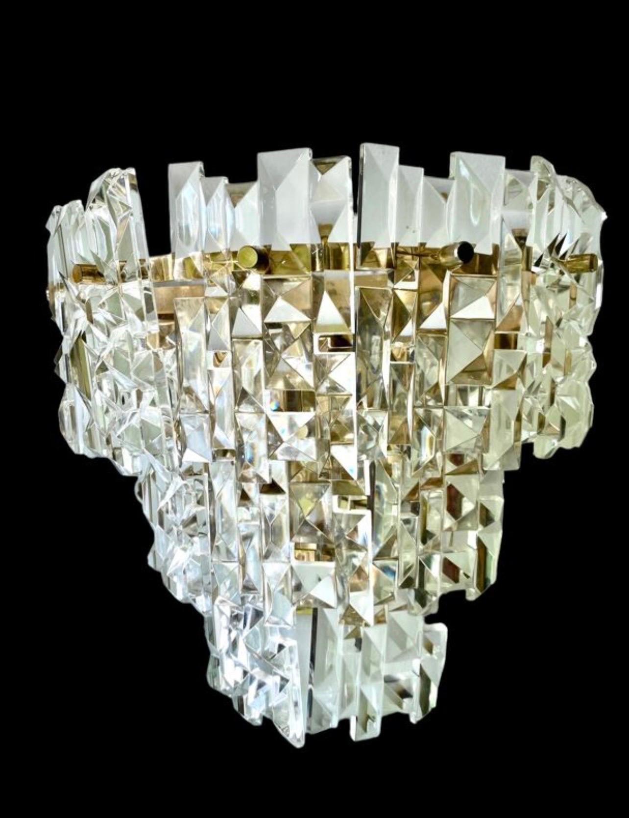 Austria pair wall lighting cut glass. The design and the quality of the glass make this piece the best of the Austrian design.

discount shipping to USA * shipping option private quote

This artistic glass piece features the exclusive design of an