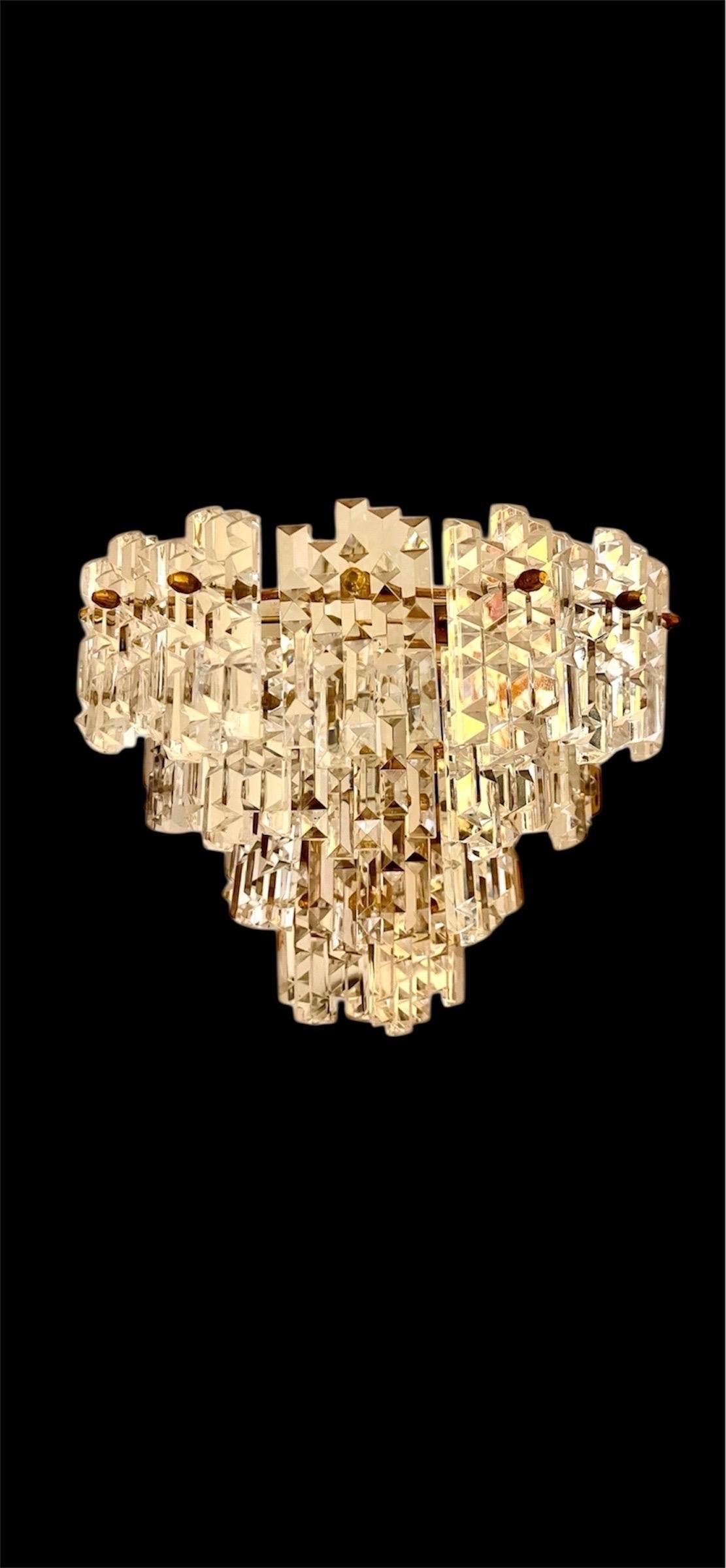 Austria pair wall lighting cut glass. The design and the quality of the glass make this piece the best of the Austrian design.

discount shipping to USA * shipping option private quote

This artistic glass piece features the exclusive design of an