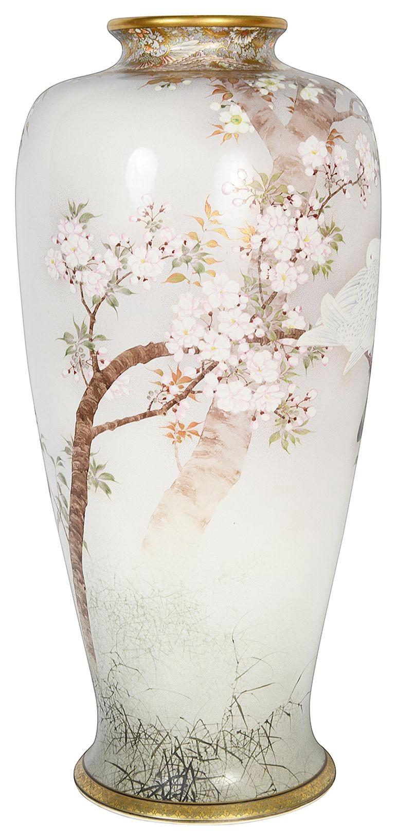 A fine quality Meiji period (1868-1912) Japanese Satsuma vase by Kinkozan.
The vase of a slender elegant shape, depicting gilded rims with exotic mythical birds around the neck, blossom trees with Doves perched on a branch.
Signed; Kinkozan to the