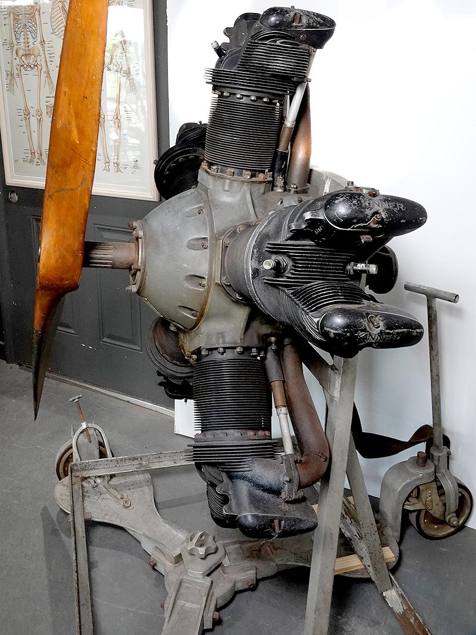 I believe this engine was never flown. During the war it was donated to a training school for teaching. In fact, what you see is the original factory paint. It comes with the wooden prop standing rack and steerable dolly.

The Kinner 5-cylinder